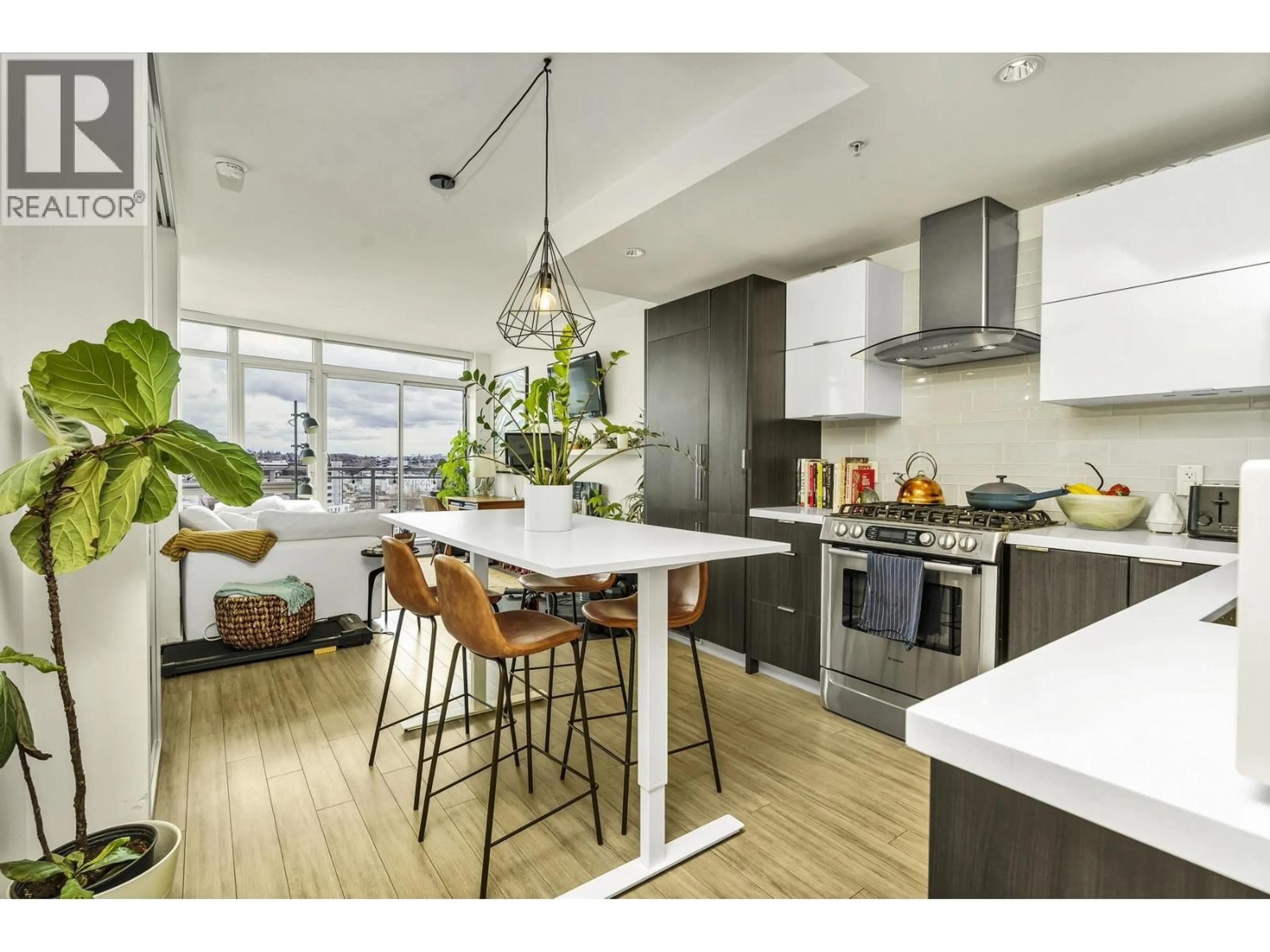Open concept kitchen, wood/laminate floor for 1604 - 1775 QUEBEC STREET, Vancouver British Columbia V5T0E3