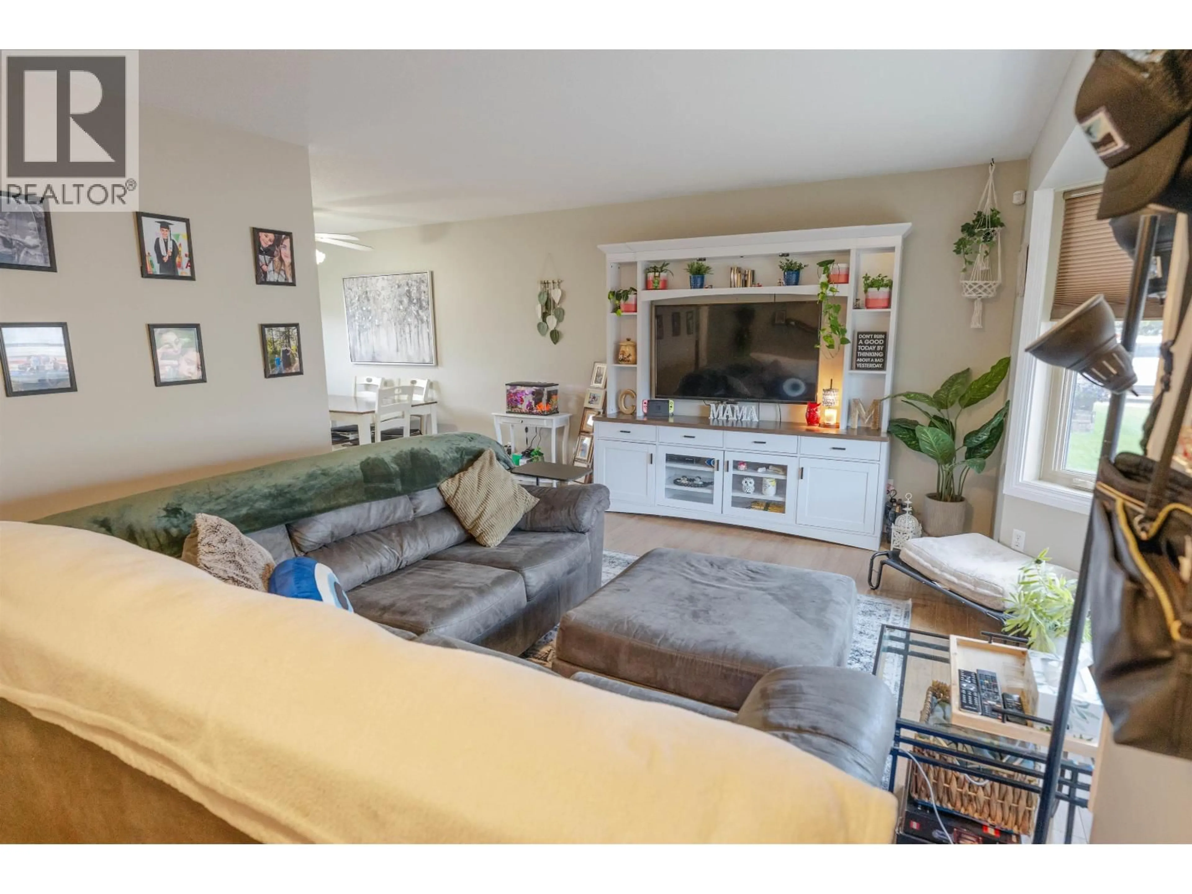 Living room with furniture, unknown for 8507 94 AVENUE, Fort St. John British Columbia V1J1E9