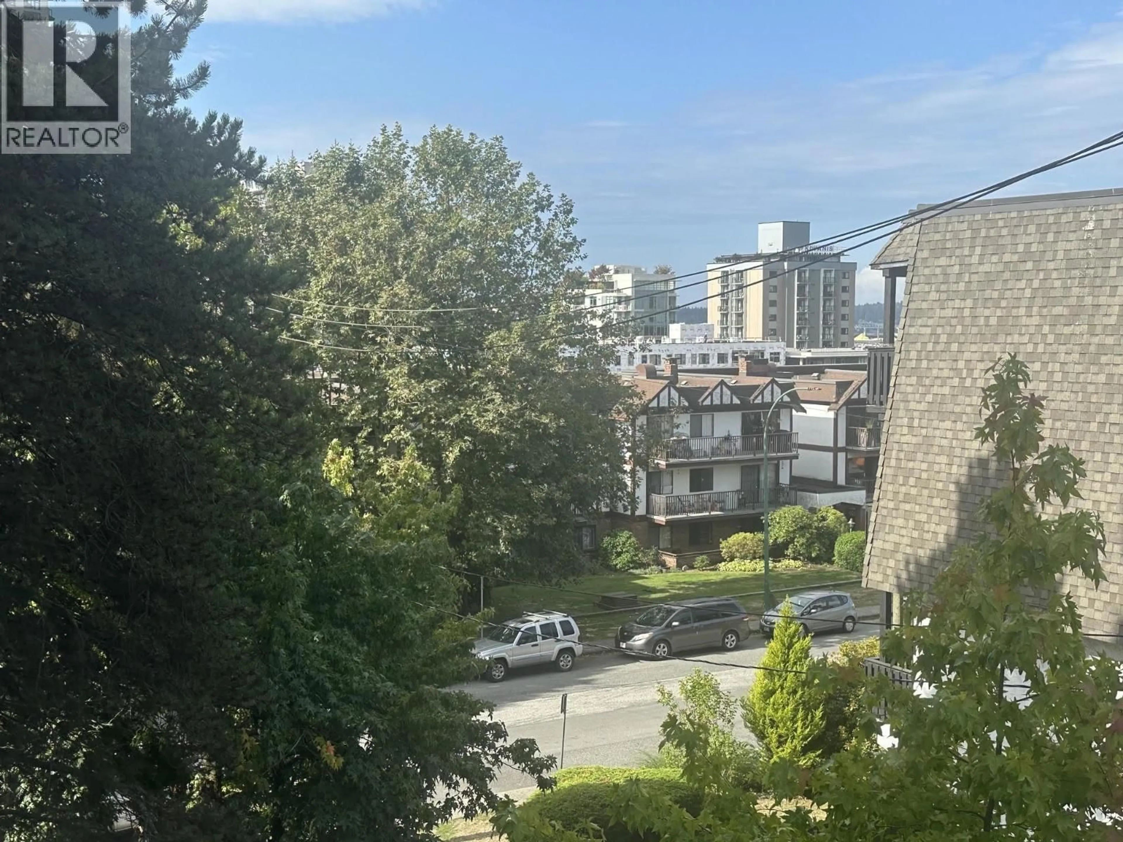 A pic from outside/outdoor area/front of a property/back of a property/a pic from drone, city buildings view from balcony for 406 - 110 4TH STREET, North Vancouver British Columbia V7M3H3