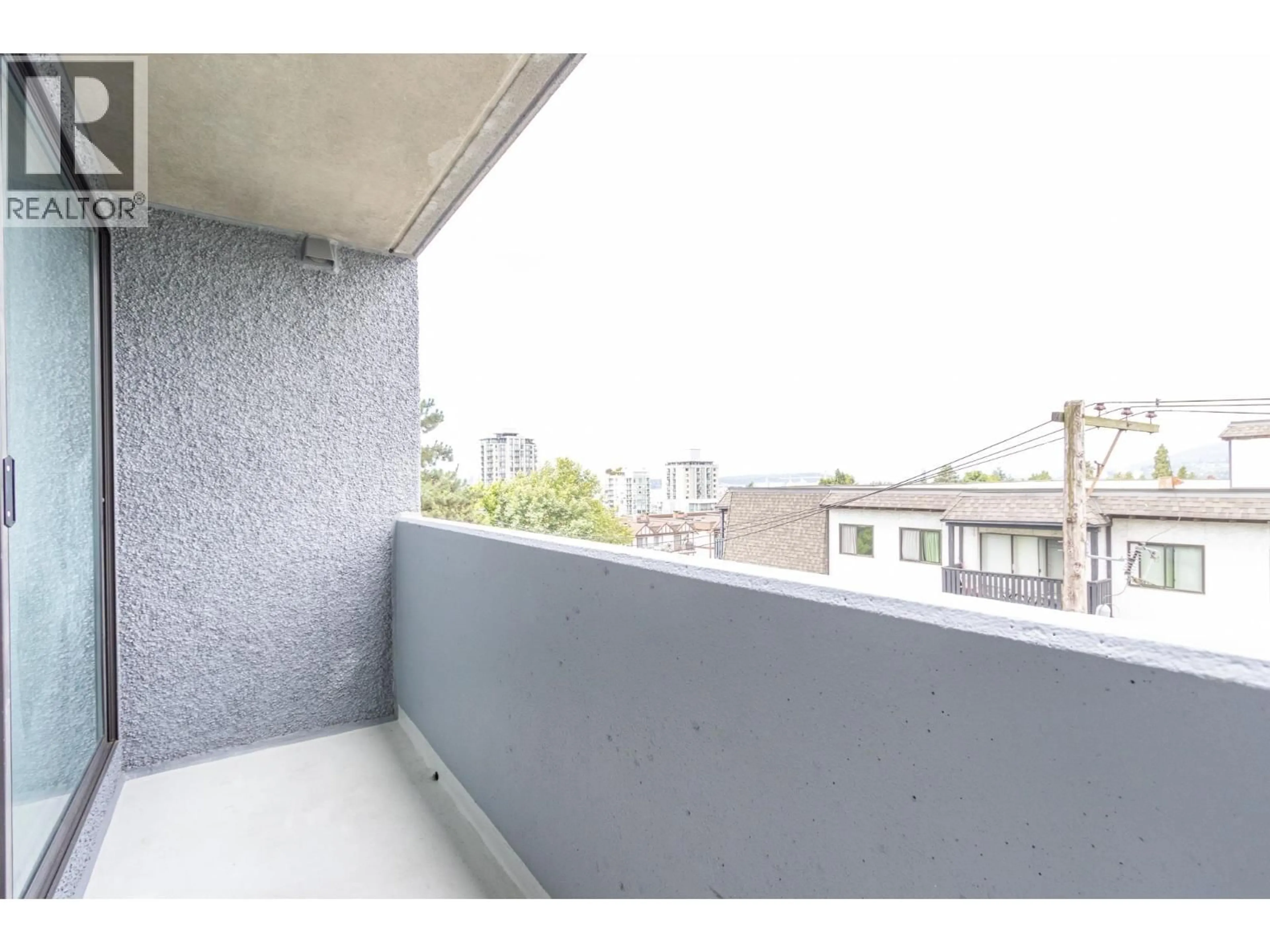 Balcony in the apartment, city buildings view from balcony for 406 - 110 4TH STREET, North Vancouver British Columbia V7M3H3