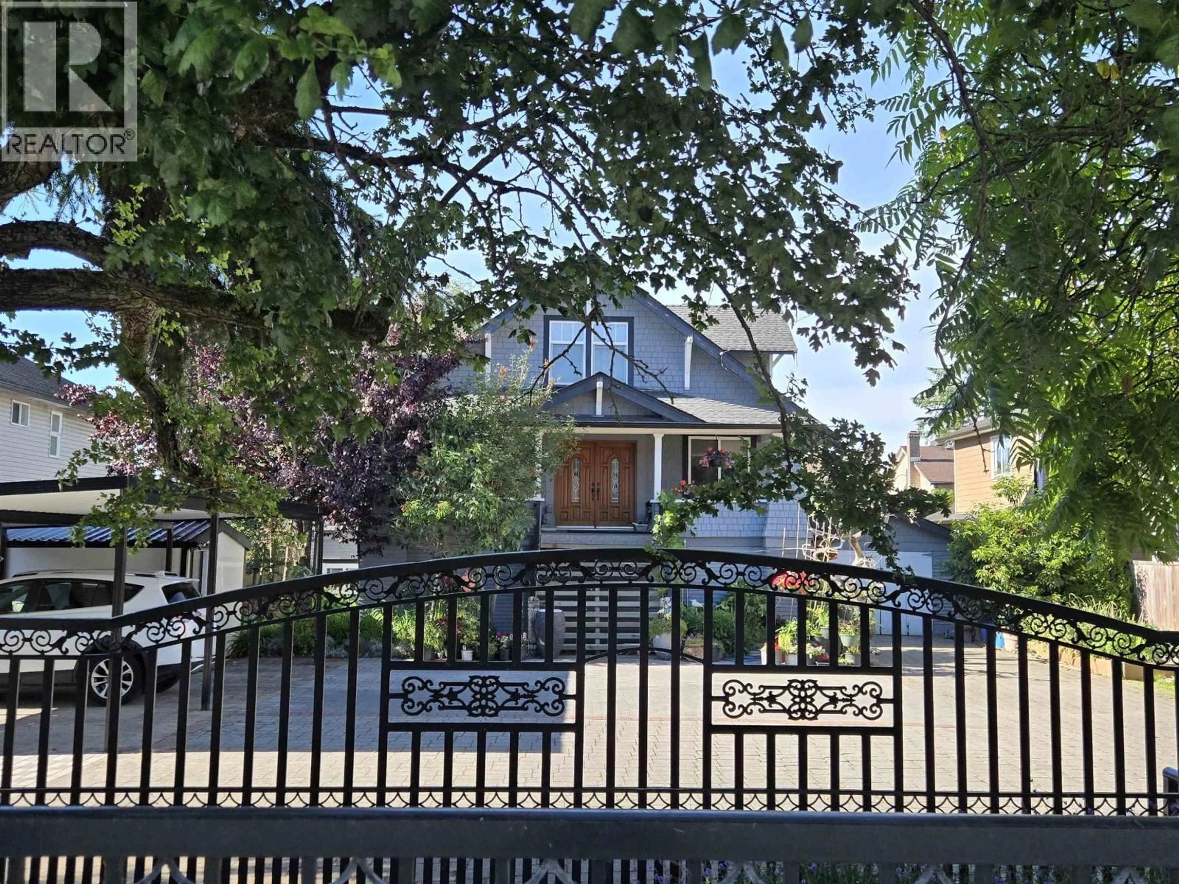 A pic from outside/outdoor area/front of a property/back of a property/a pic from drone, street for 4431 STEVESTON HIGHWAY, Vancouver British Columbia V7E2K4