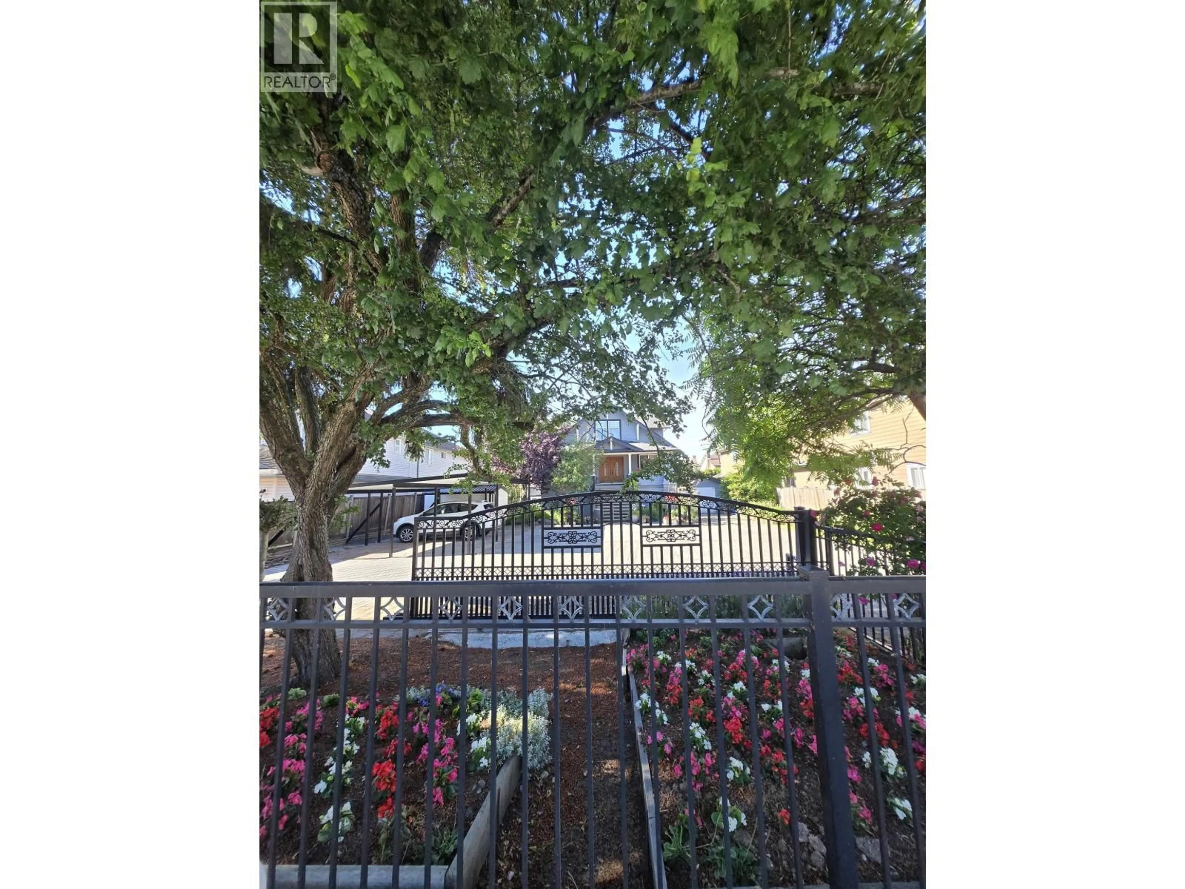 A pic from outside/outdoor area/front of a property/back of a property/a pic from drone, street for 4431 STEVESTON HIGHWAY, Vancouver British Columbia V7E2K4