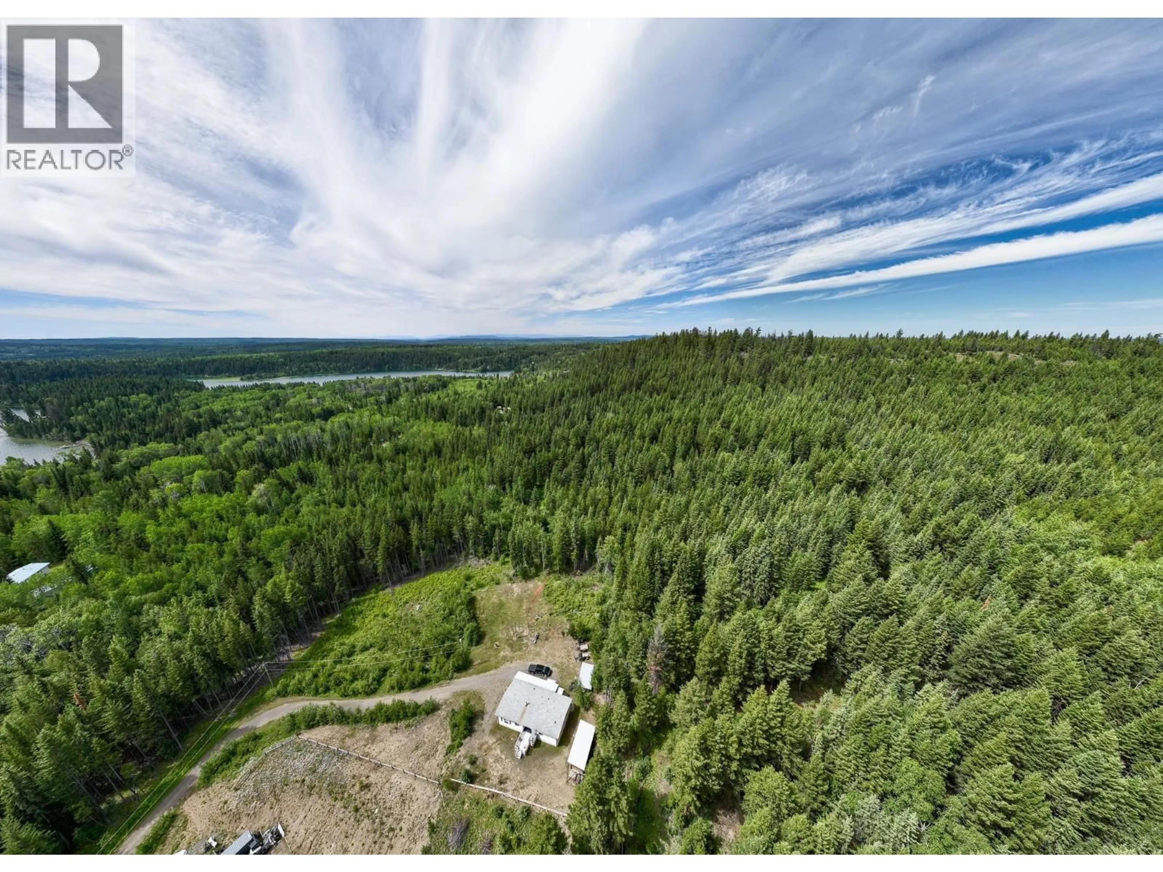 A pic from outside/outdoor area/front of a property/back of a property/a pic from drone, forest/trees view for 7384 JOHNSTONE ROAD, Bridge Lake British Columbia V0K1X2