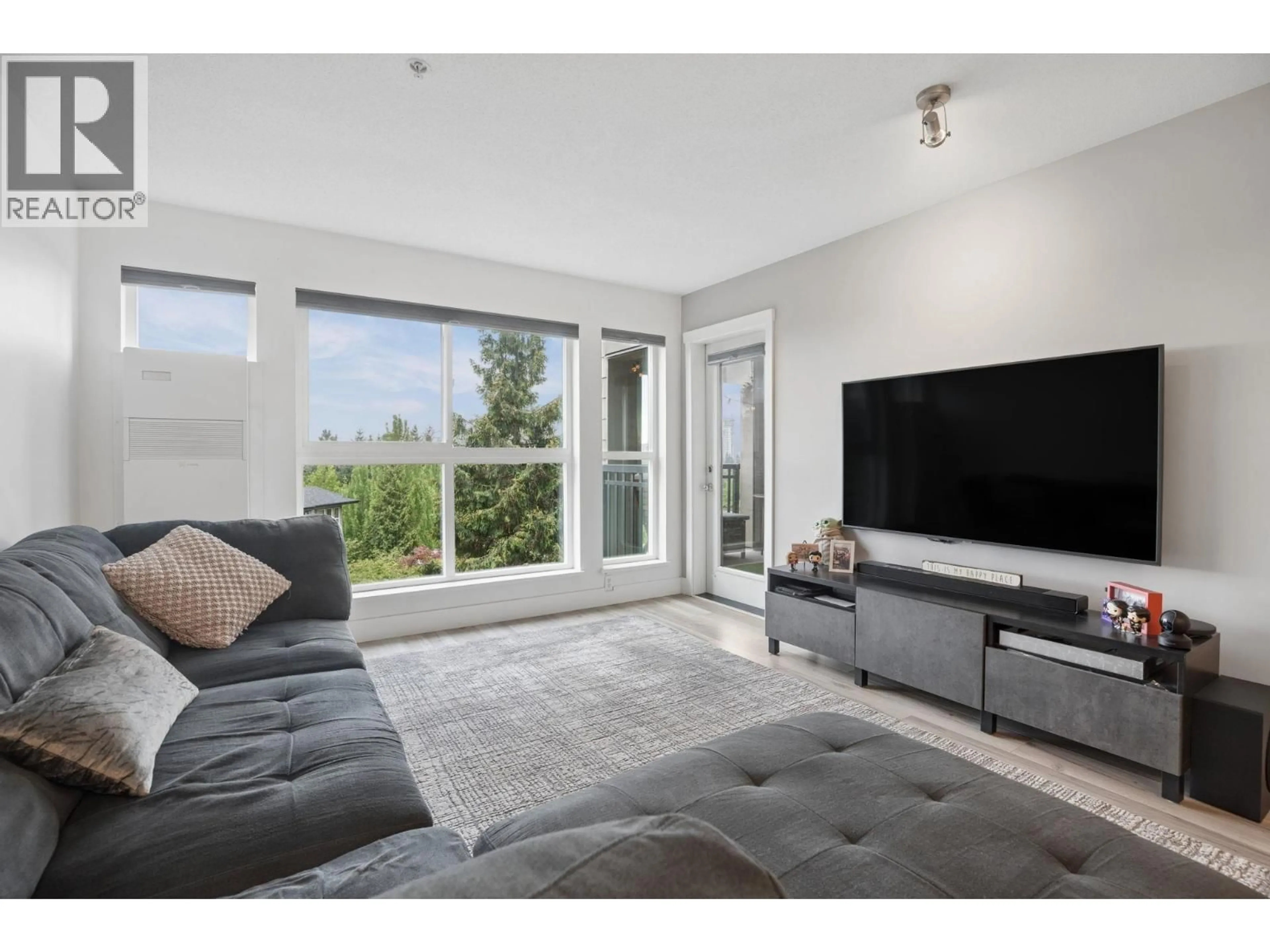 Living room with furniture, unknown for 202 - 3082 DAYANEE SPRINGS BOULEVARD, Coquitlam British Columbia V3E0A3