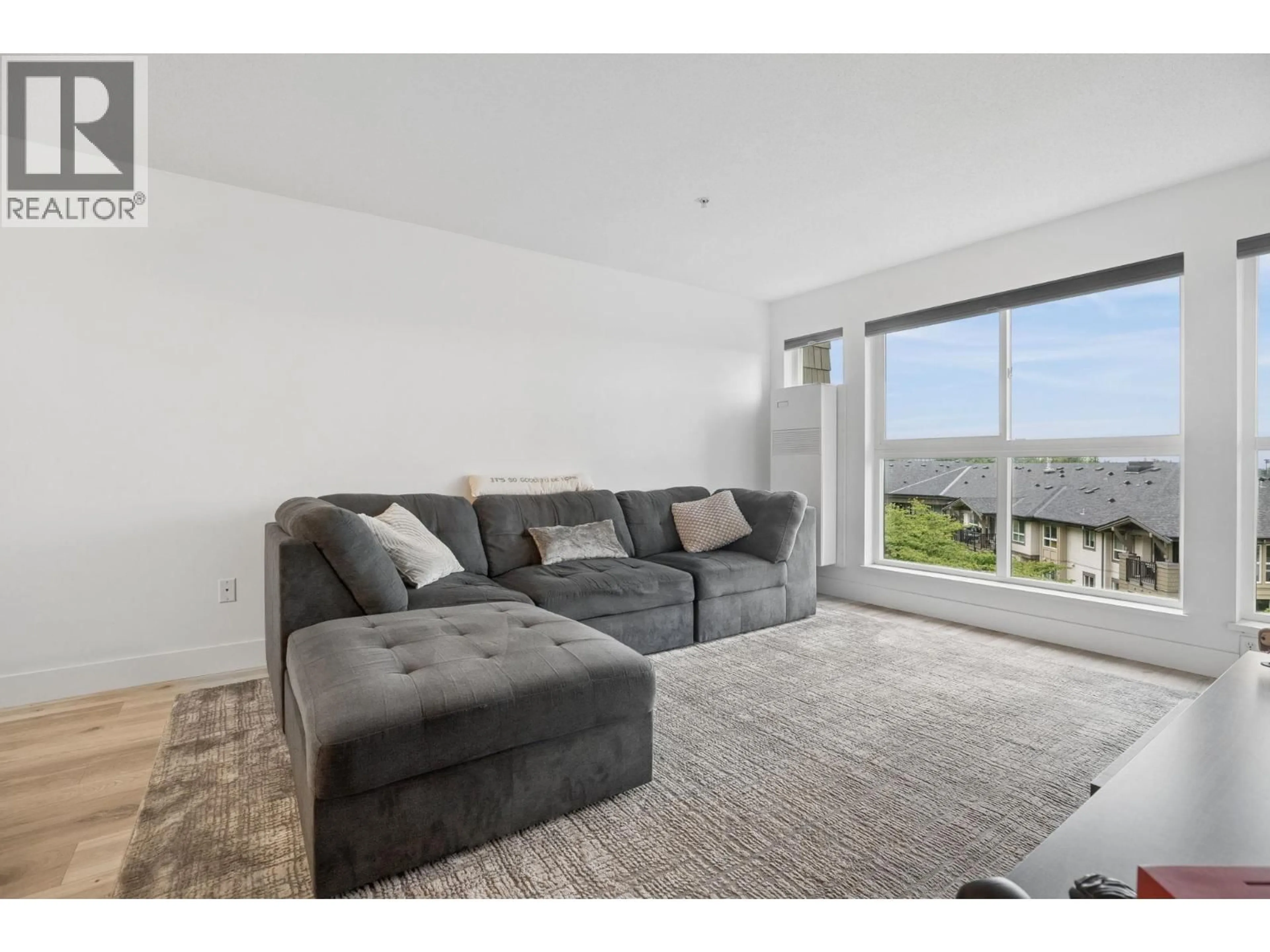 Living room with furniture, unknown for 202 - 3082 DAYANEE SPRINGS BOULEVARD, Coquitlam British Columbia V3E0A3