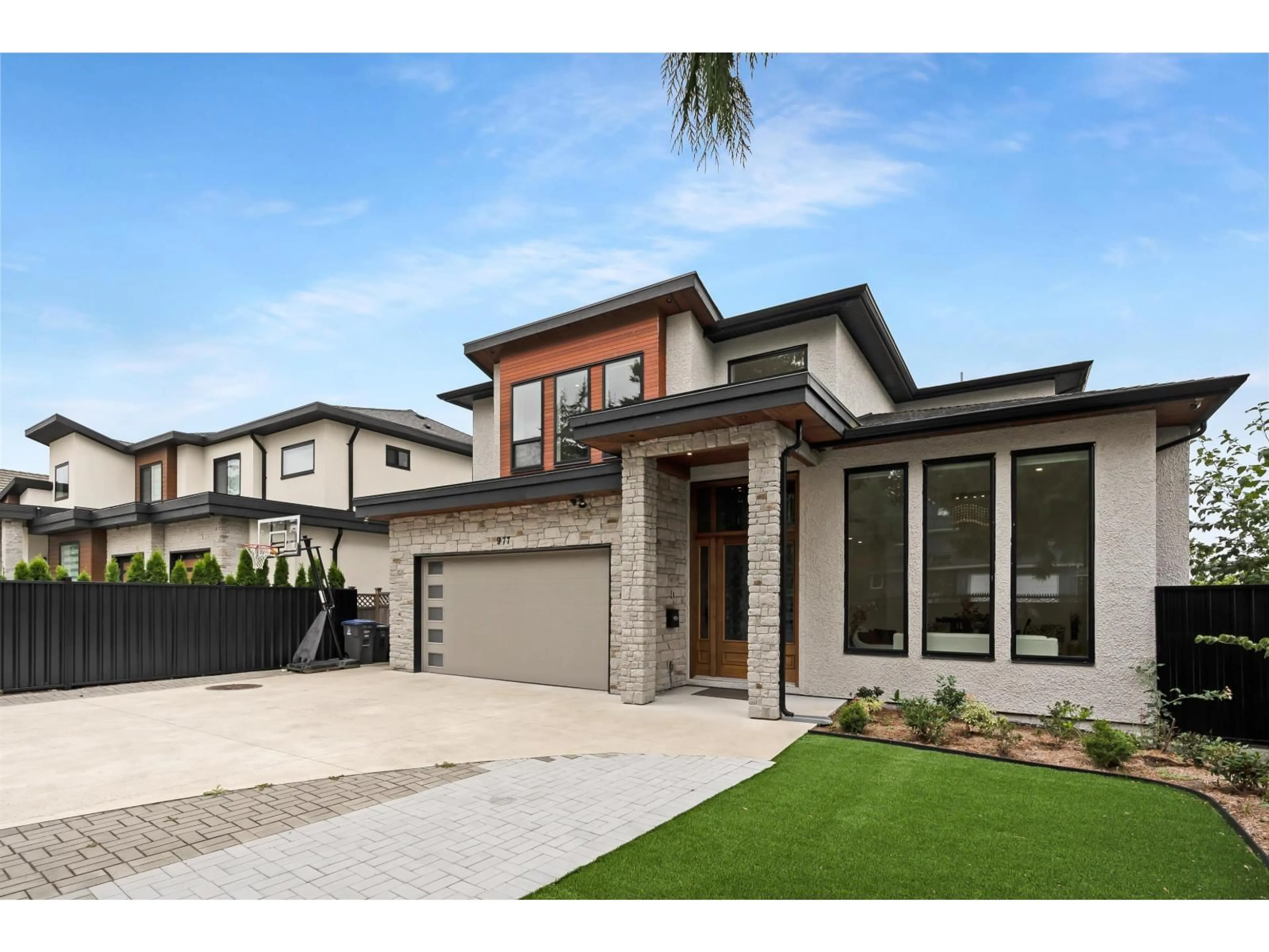 Home with brick exterior material, street for 977 164 STREET, Surrey British Columbia V4A4Y4