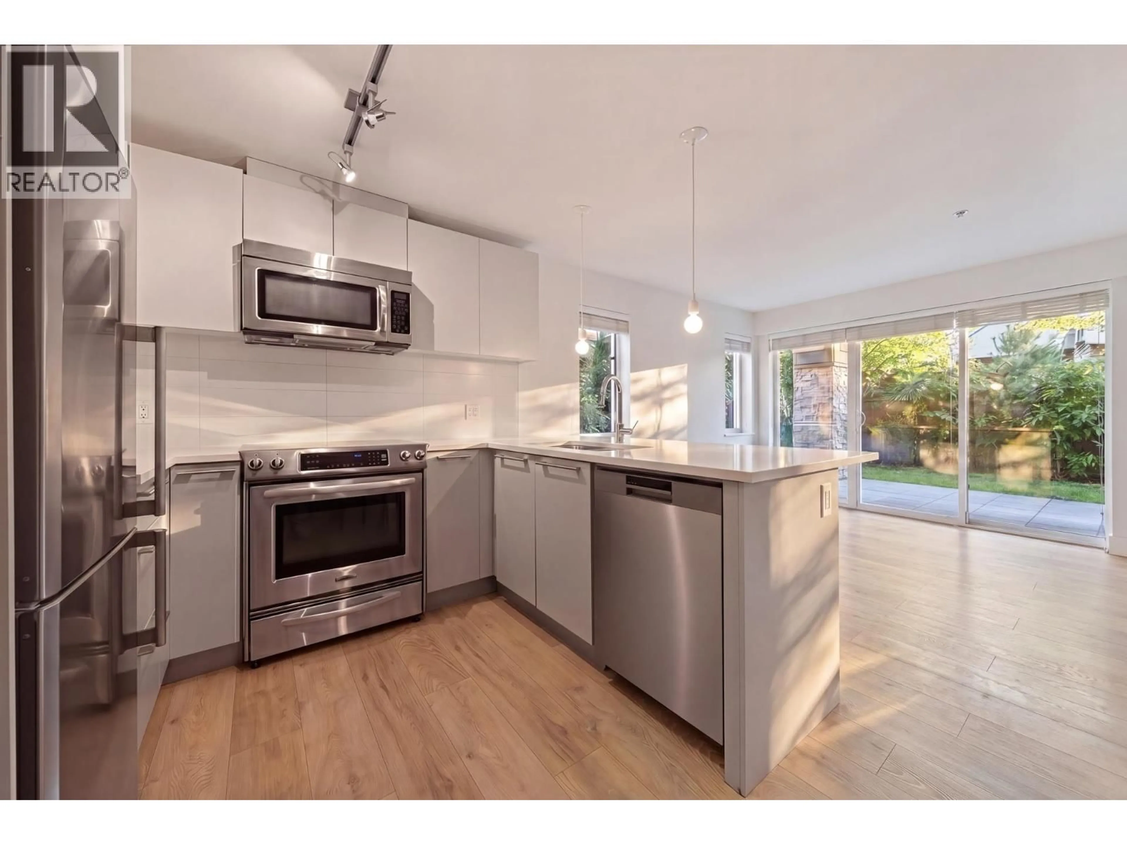 Open concept kitchen, unknown for 107 - 1661 2ND AVENUE, Vancouver British Columbia V5N1E1