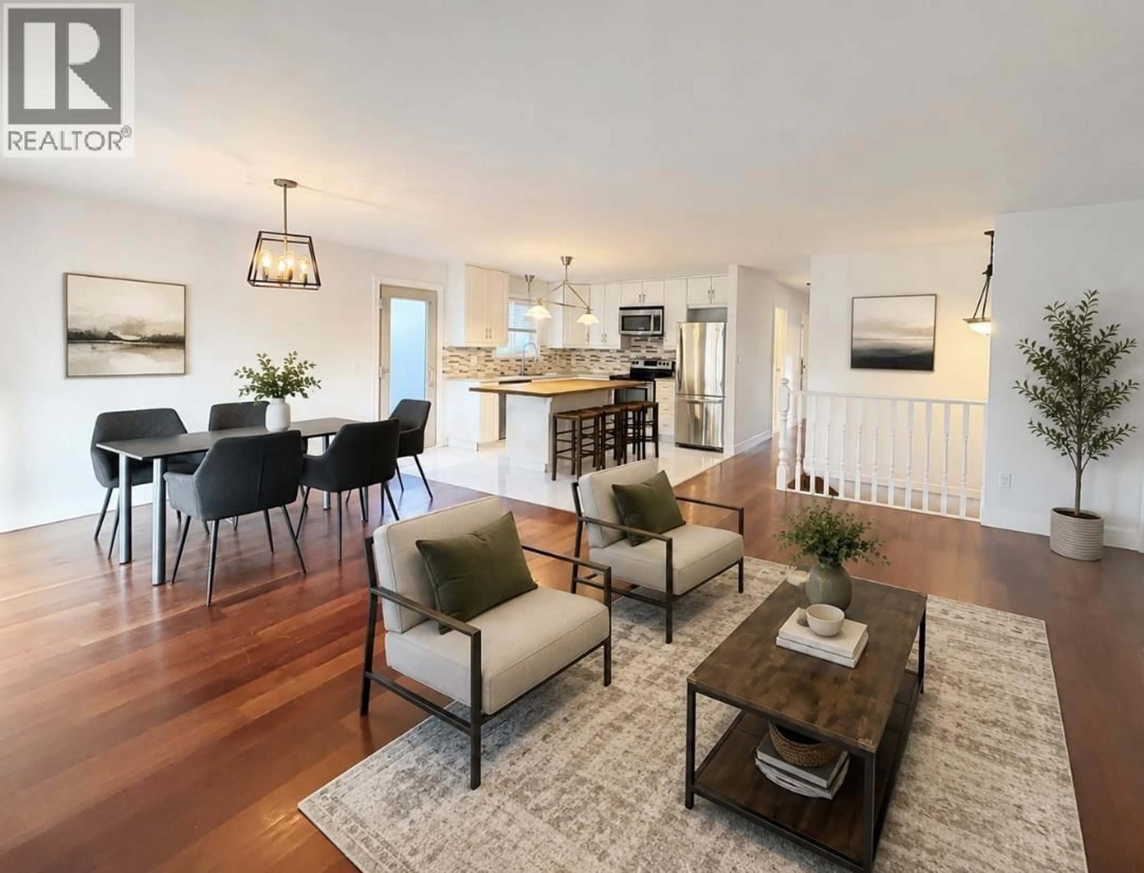 Living room with furniture, wood/laminate floor for 1944 PRAIRIE AVENUE, Port Coquitlam British Columbia V3B1V4