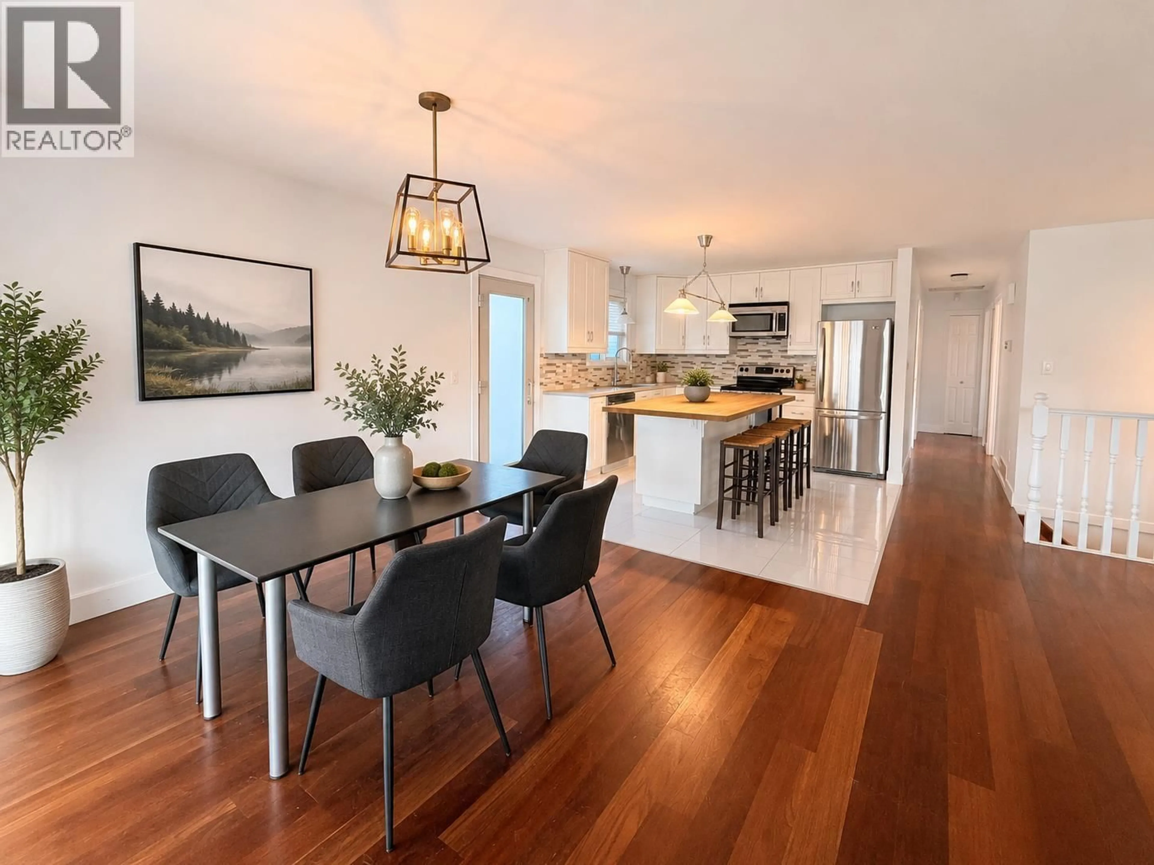 Open concept kitchen, wood/laminate floor for 1944 PRAIRIE AVENUE, Port Coquitlam British Columbia V3B1V4