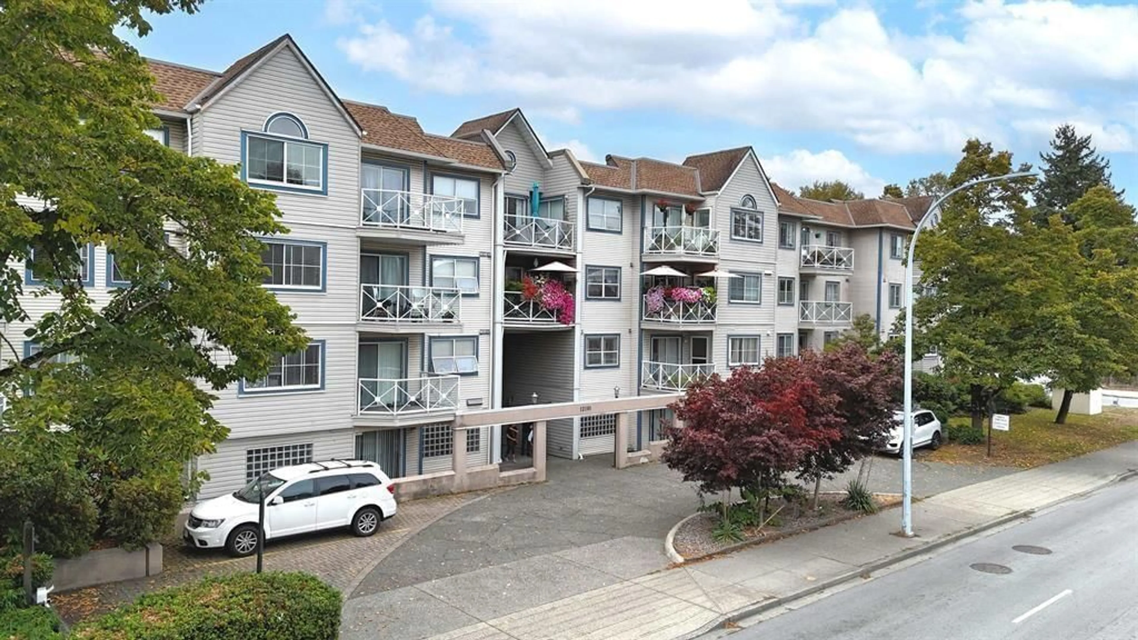 A pic from outside/outdoor area/front of a property/back of a property/a pic from drone, unknown for 121 - 12101 80 AVENUE, Surrey British Columbia V3W5V6
