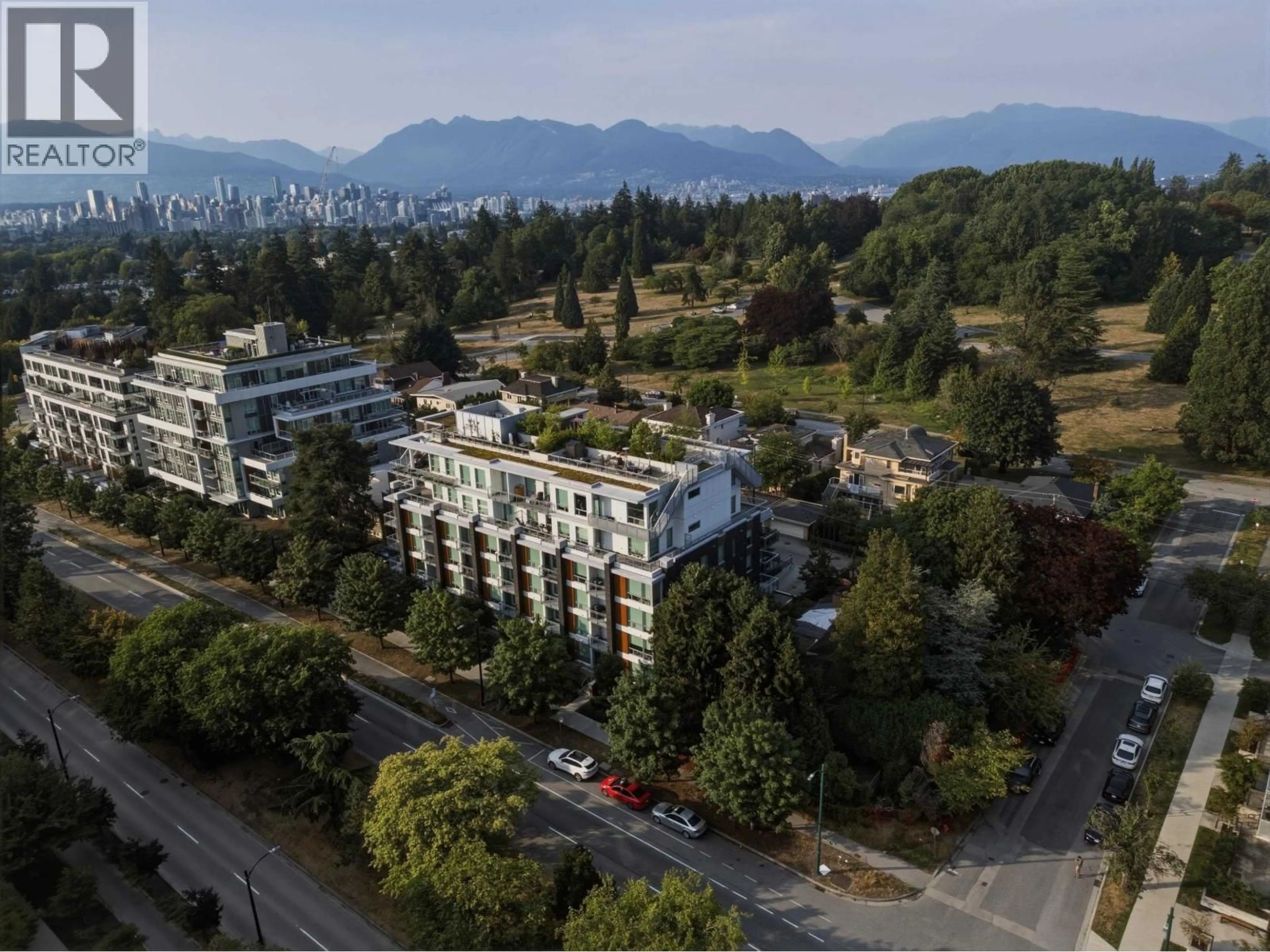 A pic from outside/outdoor area/front of a property/back of a property/a pic from drone, mountain view for 206 - 5058 CAMBIE STREET, Vancouver British Columbia V5Z2Z5