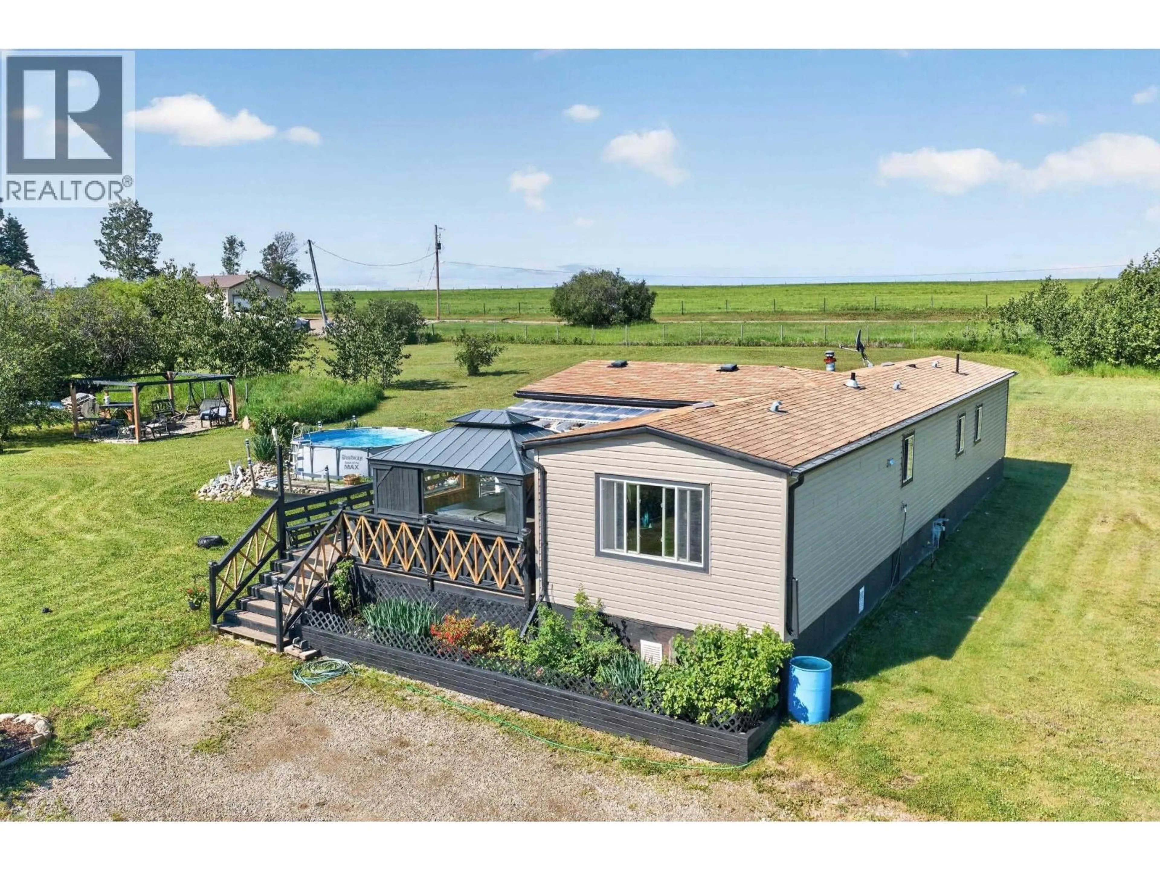 A pic from outside/outdoor area/front of a property/back of a property/a pic from drone, unknown for 6419 NORTH PINE ROAD, Fort St. John British Columbia V0C2A0