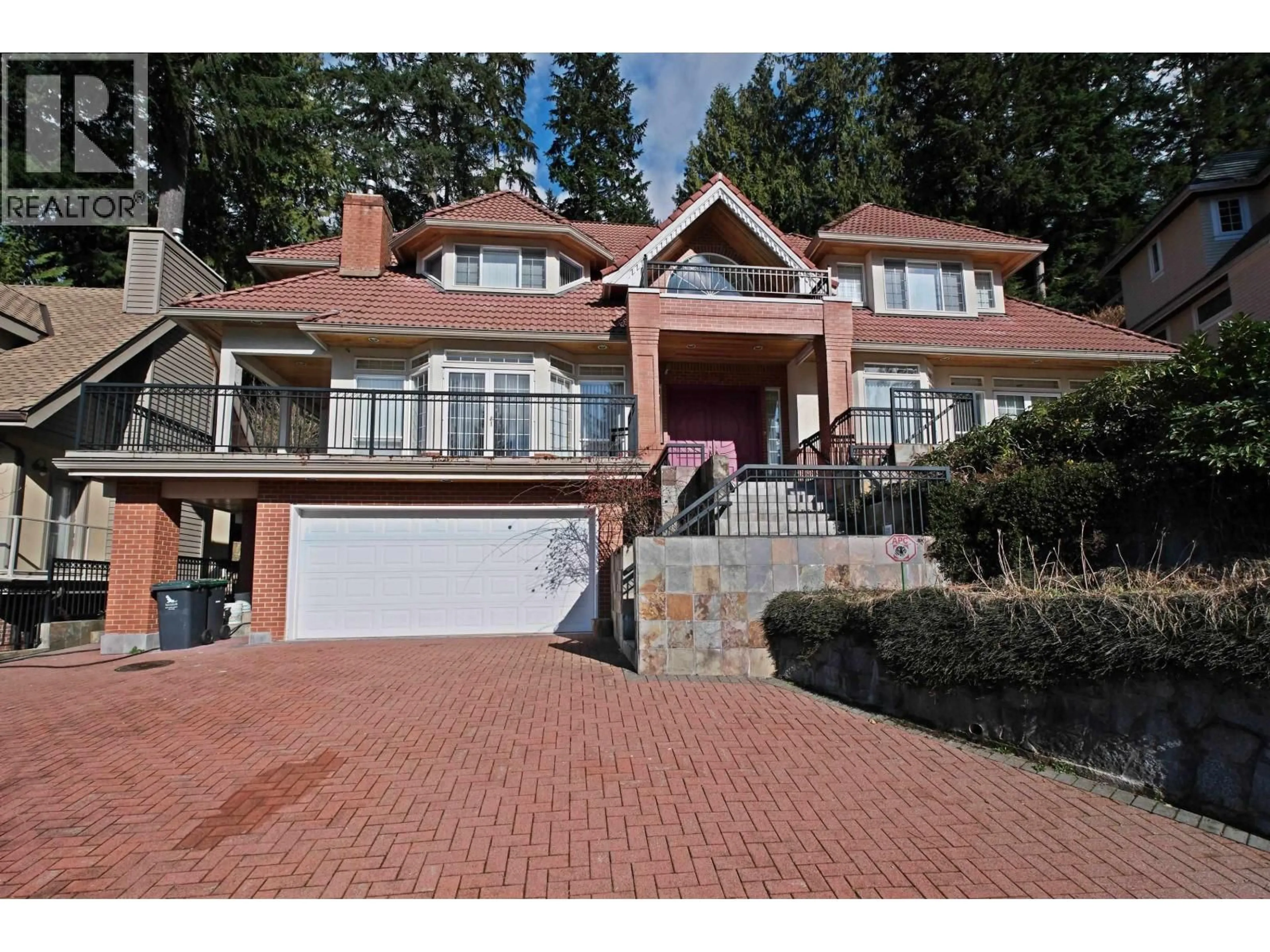 Home with brick exterior material, street for 4989 CHALET PLACE, North Vancouver British Columbia V7R4X4