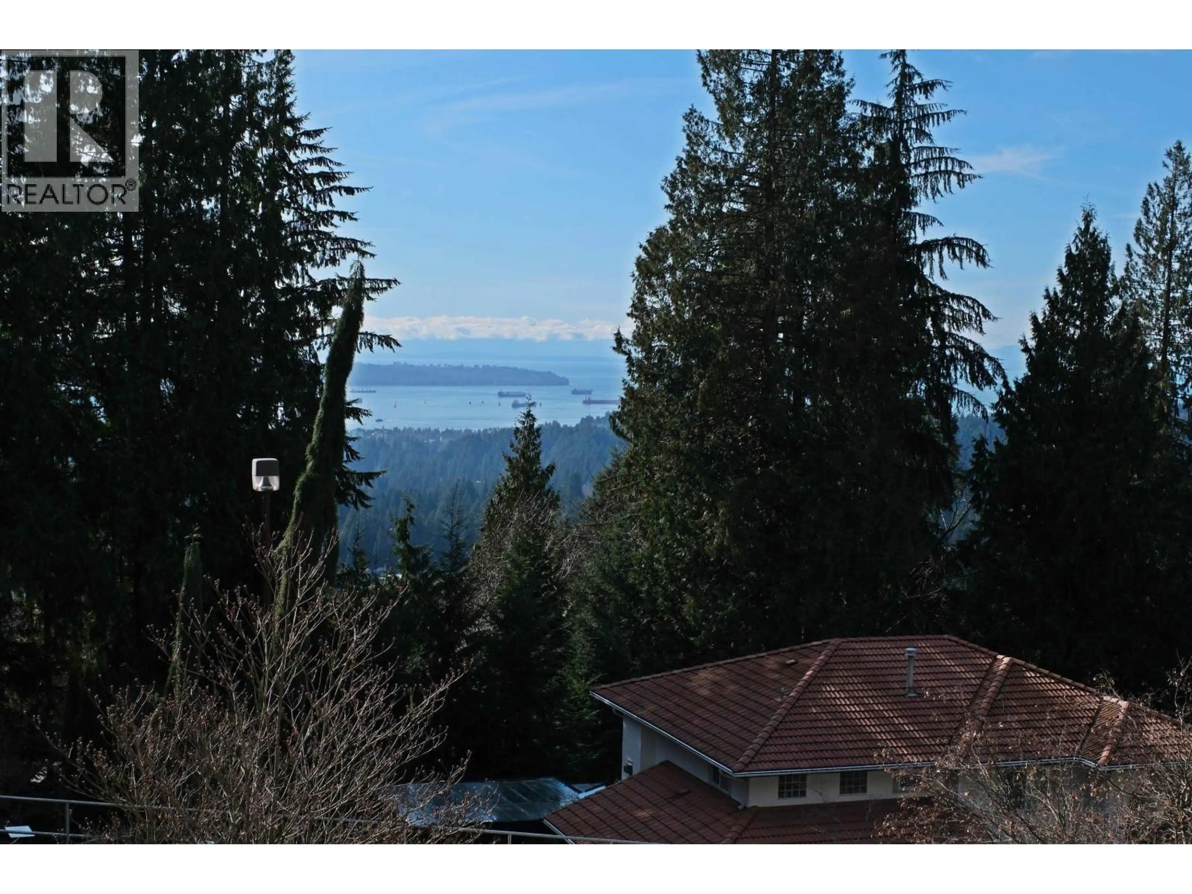 A pic from outside/outdoor area/front of a property/back of a property/a pic from drone, mountain view for 4989 CHALET PLACE, North Vancouver British Columbia V7R4X4