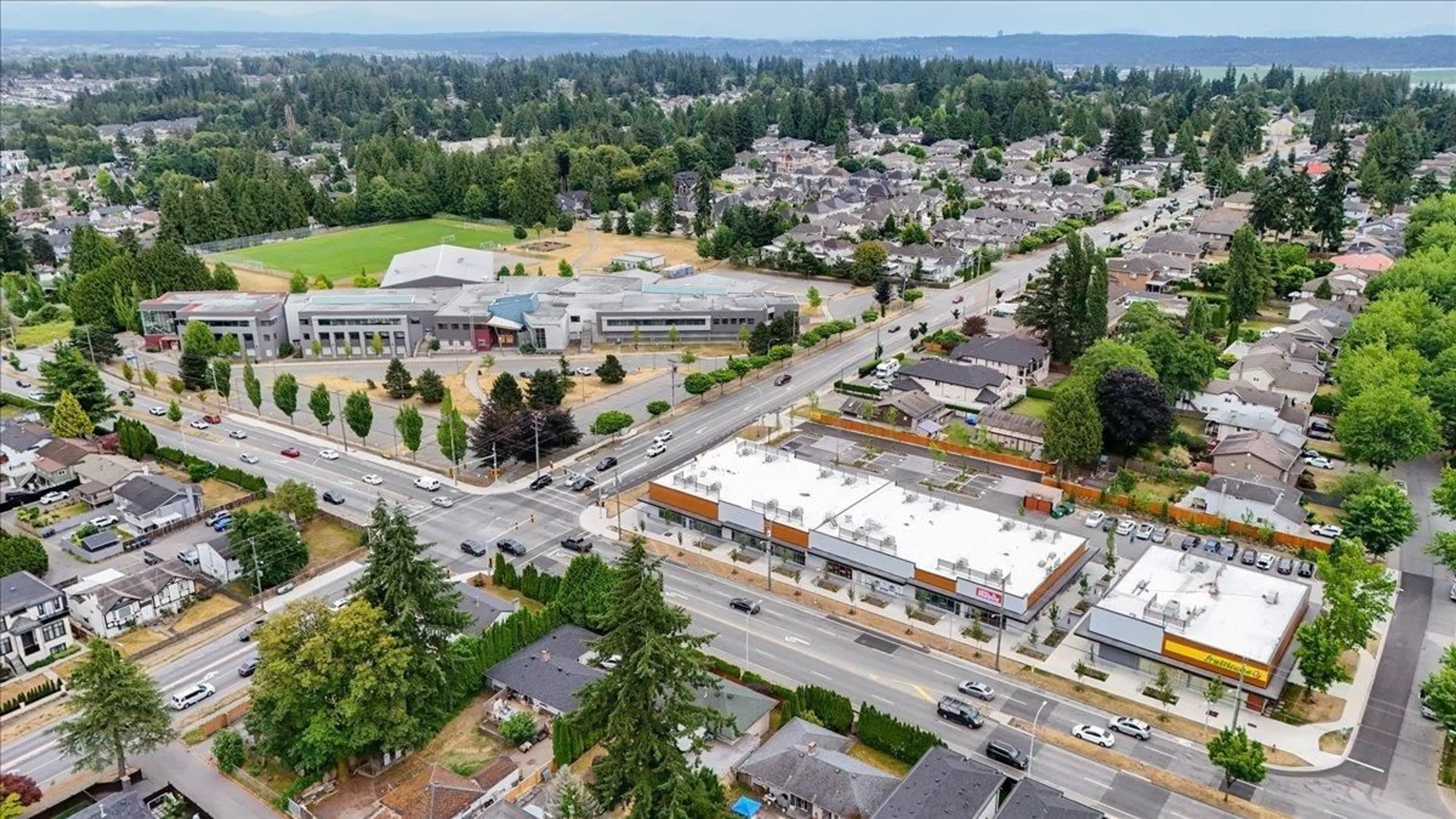 A pic from outside/outdoor area/front of a property/back of a property/a pic from drone, unknown for 6497 131A STREET, Surrey British Columbia V3W7P4