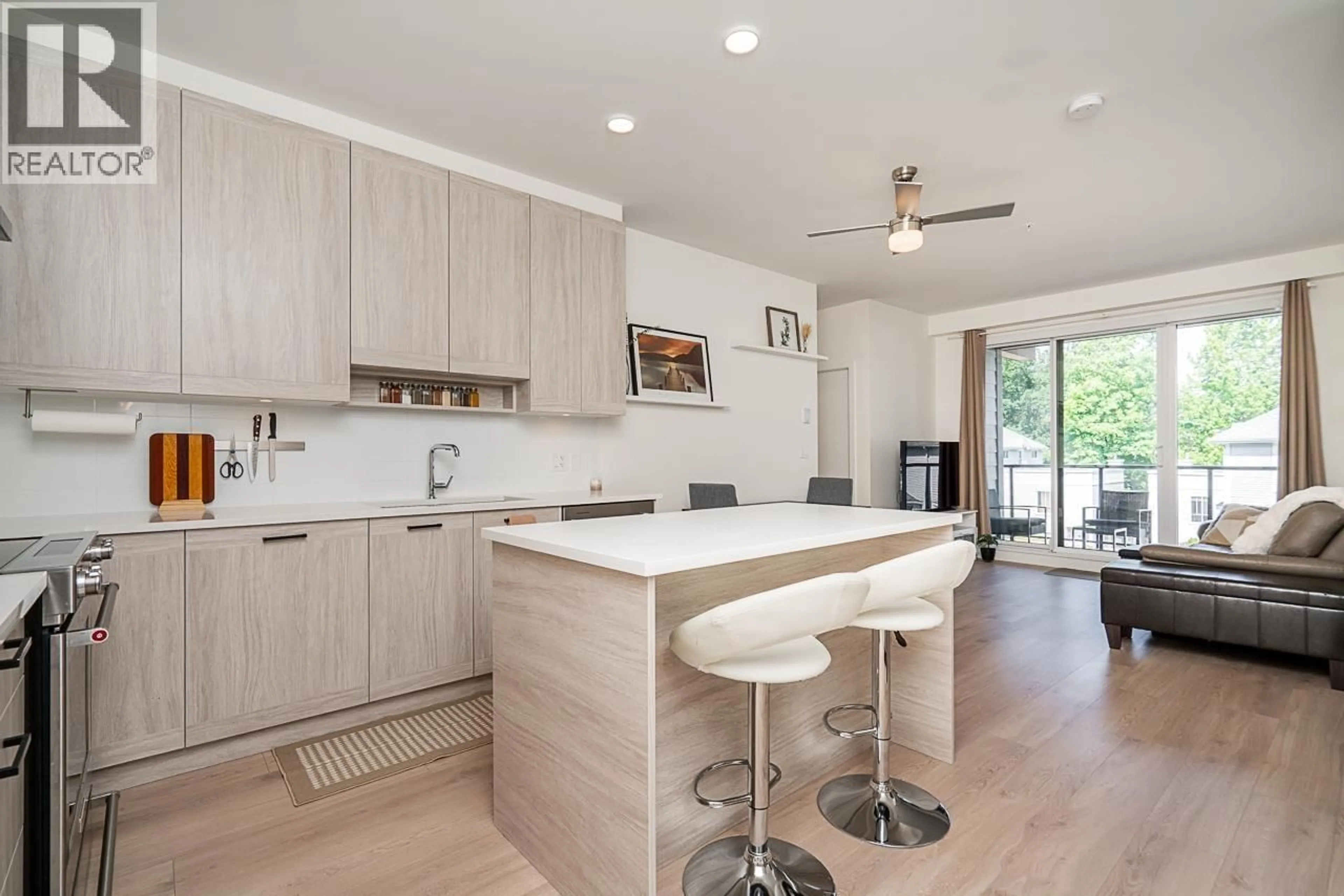 Open concept kitchen, wood/laminate floor for 303 - 7579 16TH STREET, Burnaby British Columbia V3N0H7