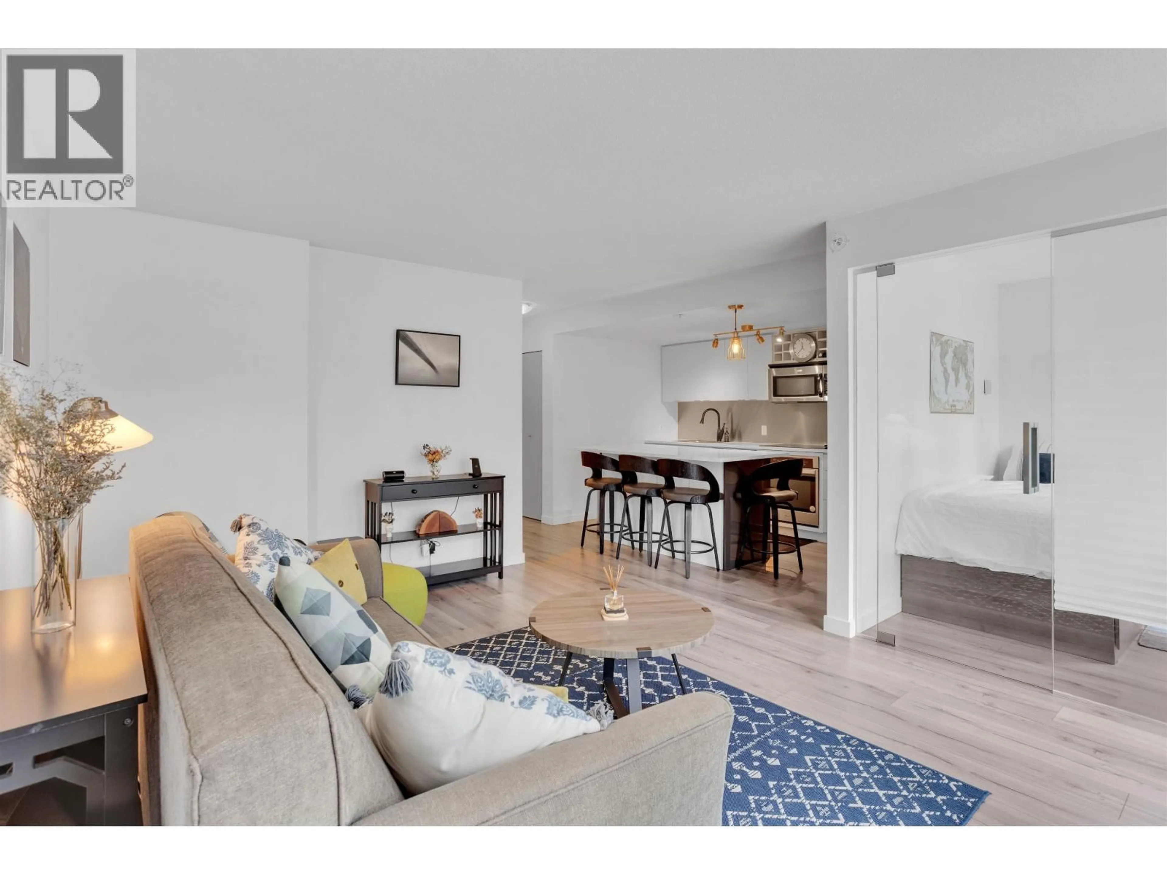 Living room with furniture, wood/laminate floor for 502 - 233 ROBSON STREET, Vancouver British Columbia V6B0E8