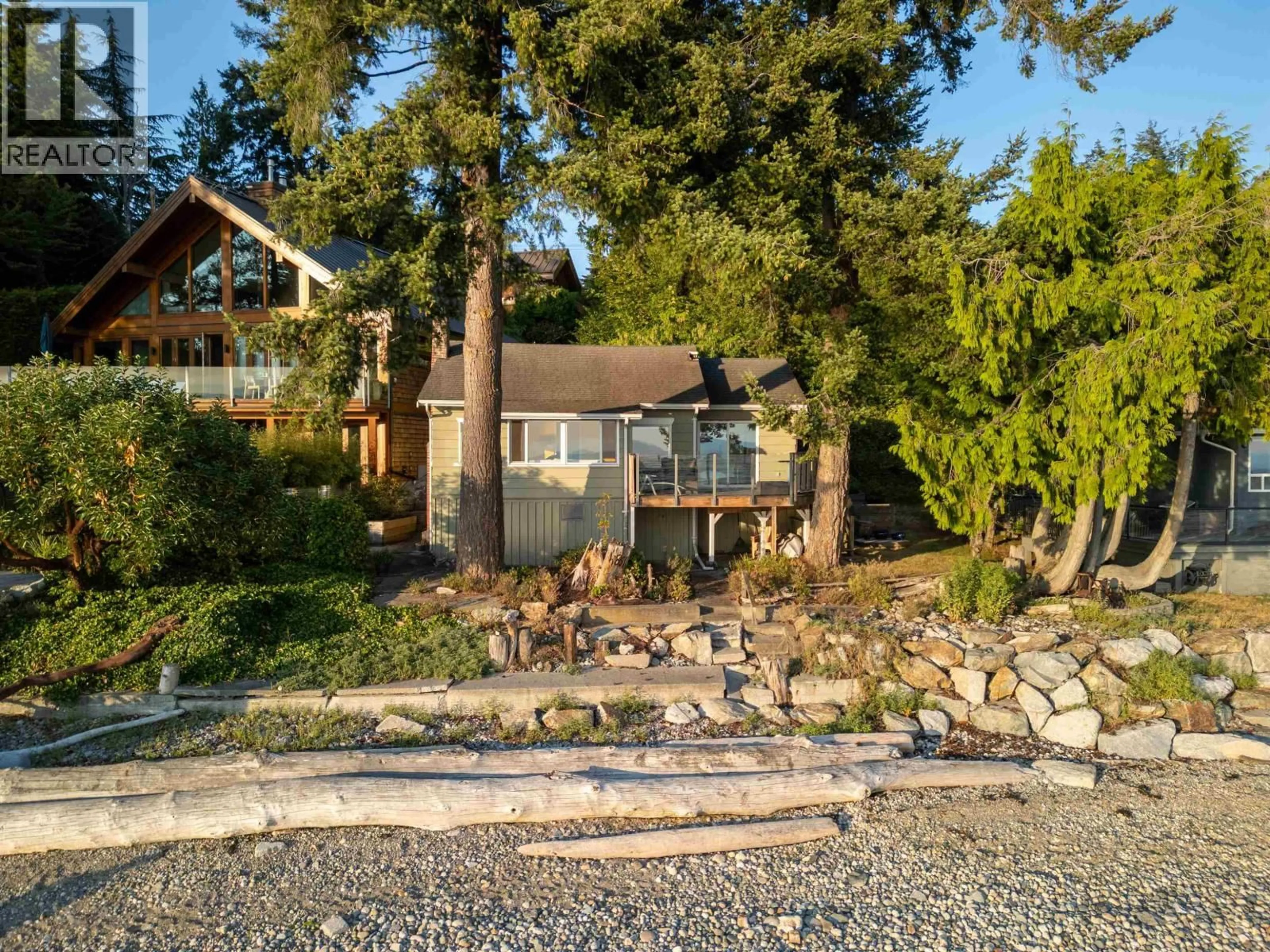 A pic from outside/outdoor area/front of a property/back of a property/a pic from drone, water/lake/river/ocean view for 4861 SUNSHINE COAST HIGHWAY, Sechelt British Columbia V7Z0B6