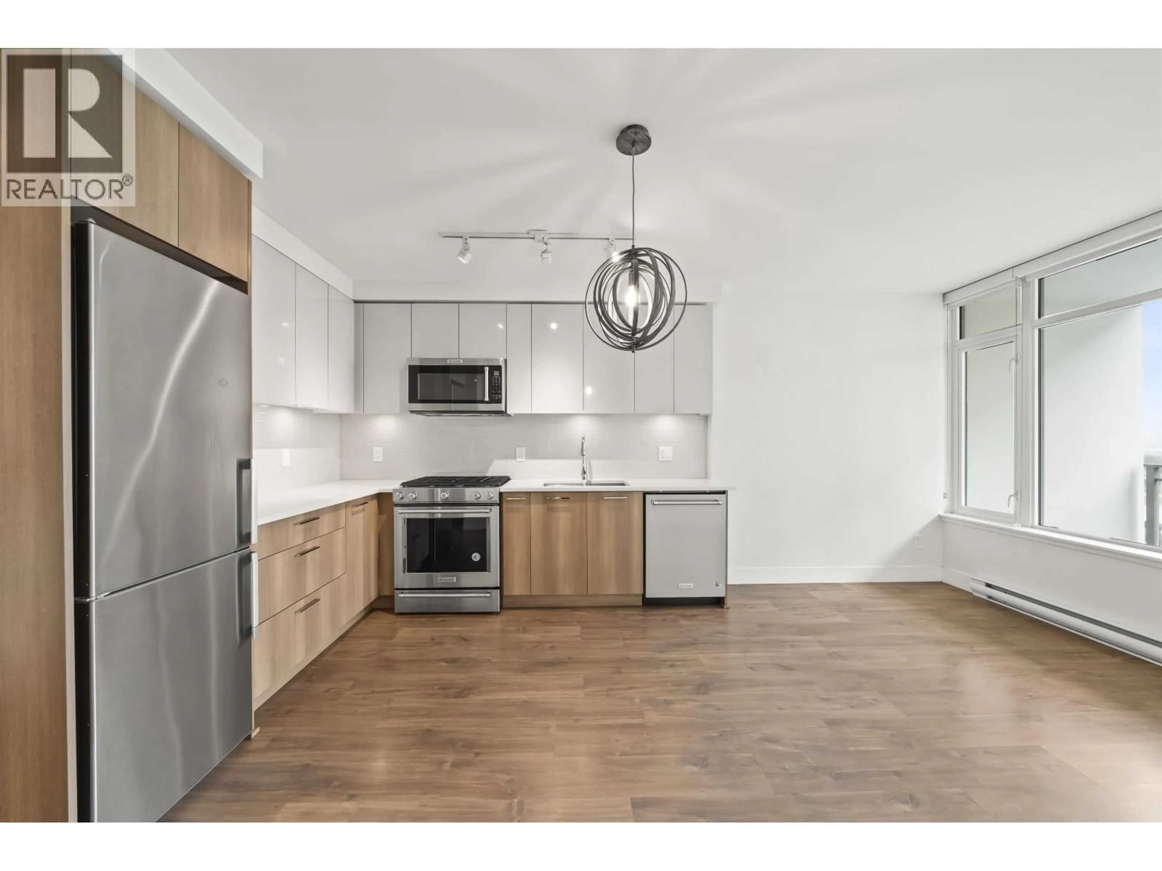 Open concept kitchen, wood/laminate floor for 1301 - 258 NELSON'S COURT, New Westminster British Columbia V3L0J9