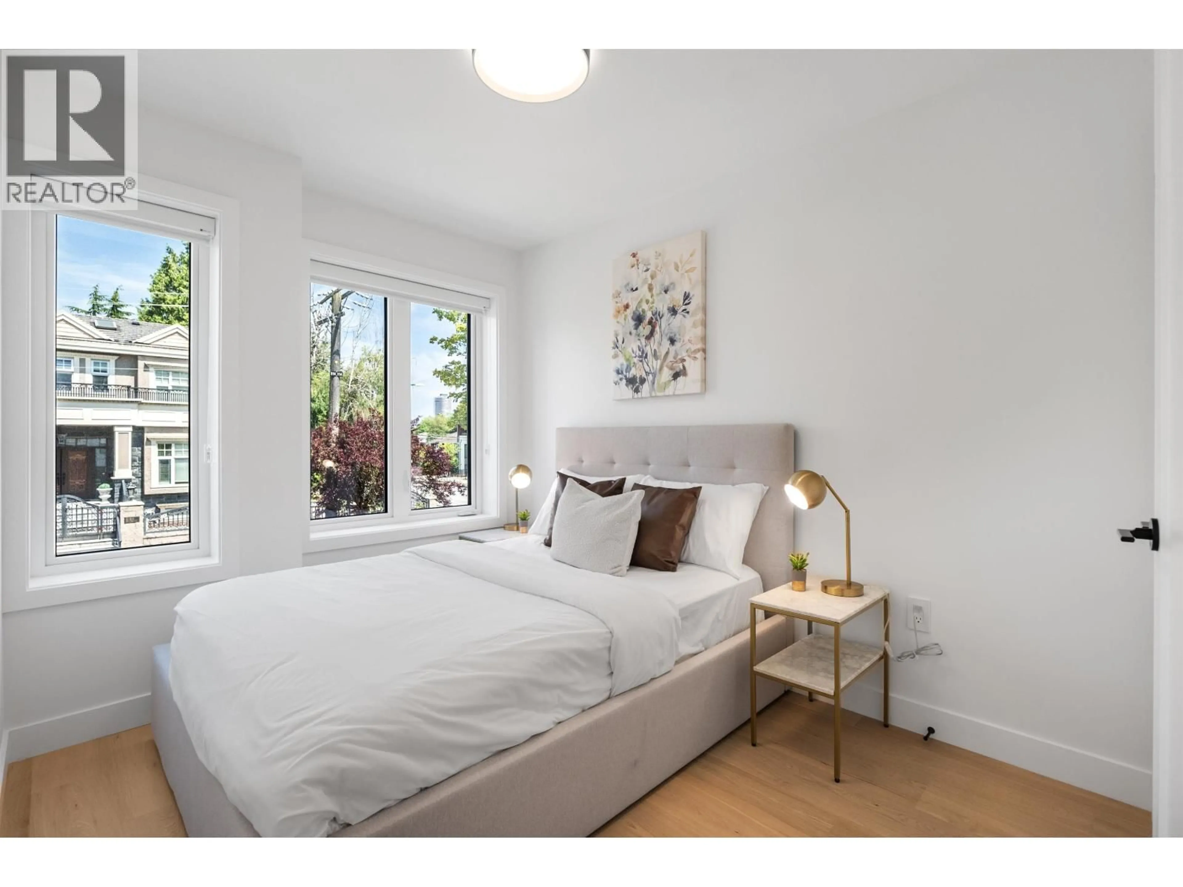 Bedroom with bed, wood/laminate floor for 1010 52ND AVENUE, Vancouver British Columbia V6P1H5