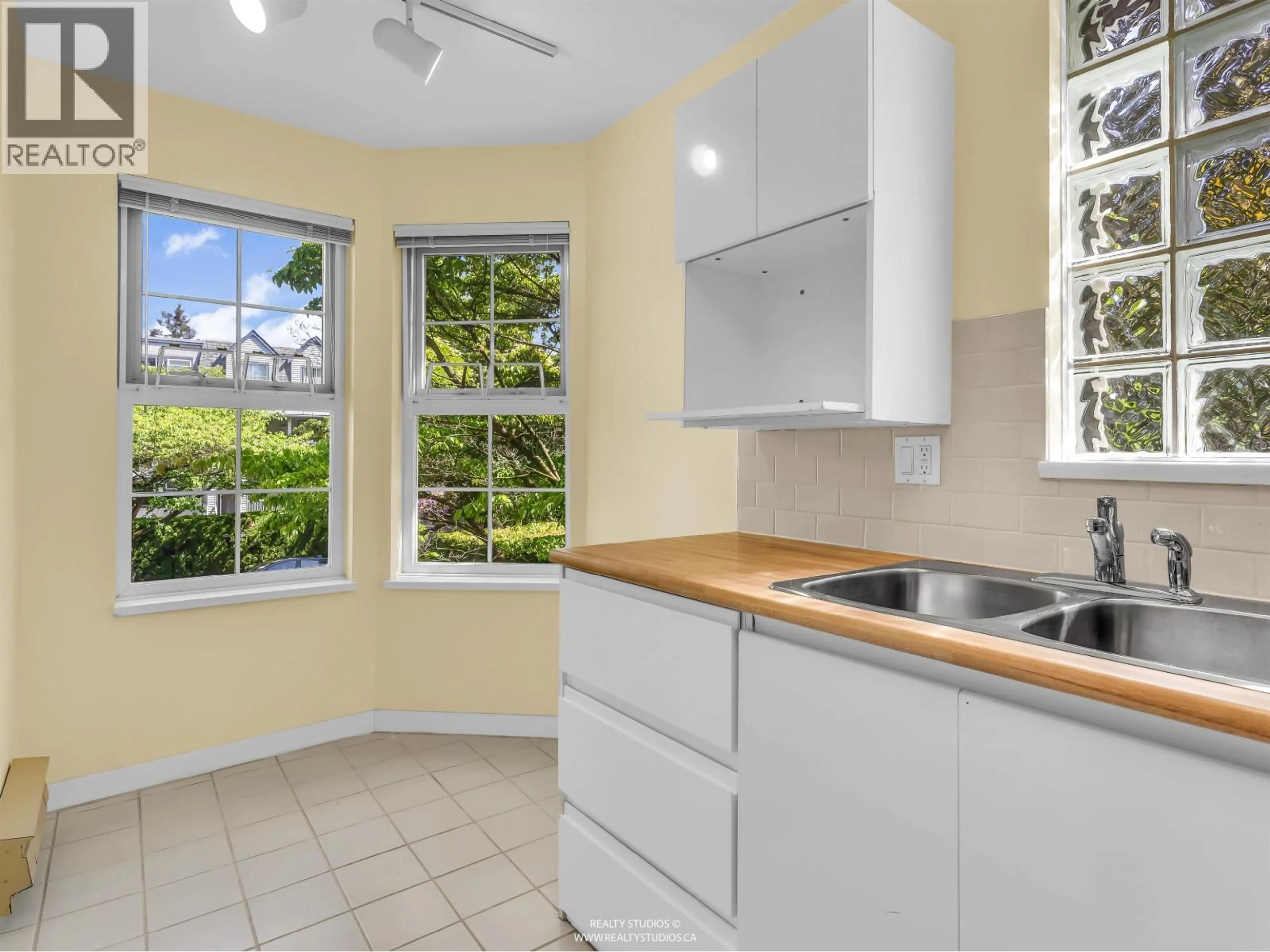 Standard kitchen, ceramic/tile floor for 204 - 876 16TH AVENUE, Vancouver British Columbia V5Z1T1