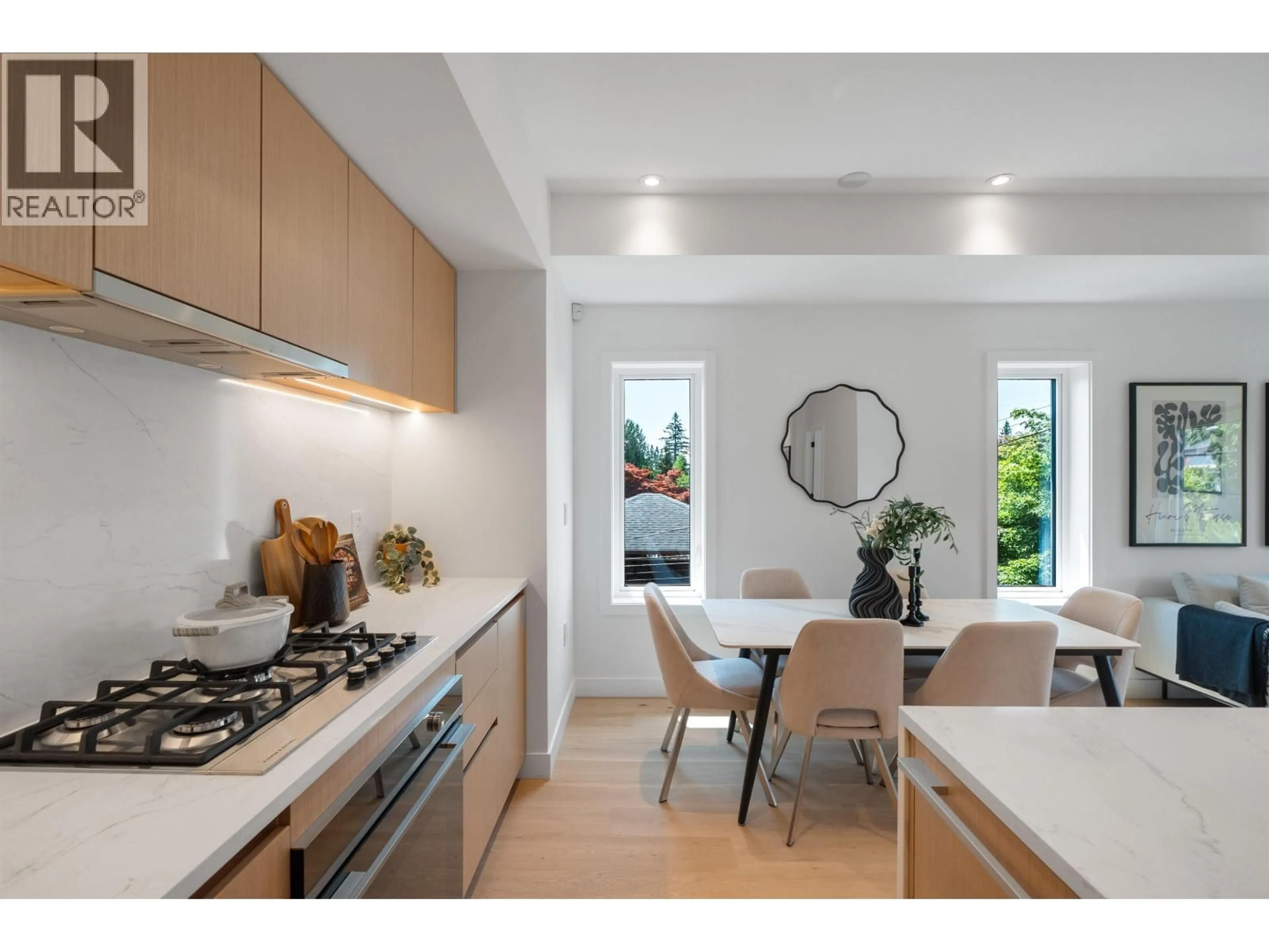 Open concept kitchen, wood/laminate floor for 1012 52ND AVENUE, Vancouver British Columbia V6P1H5