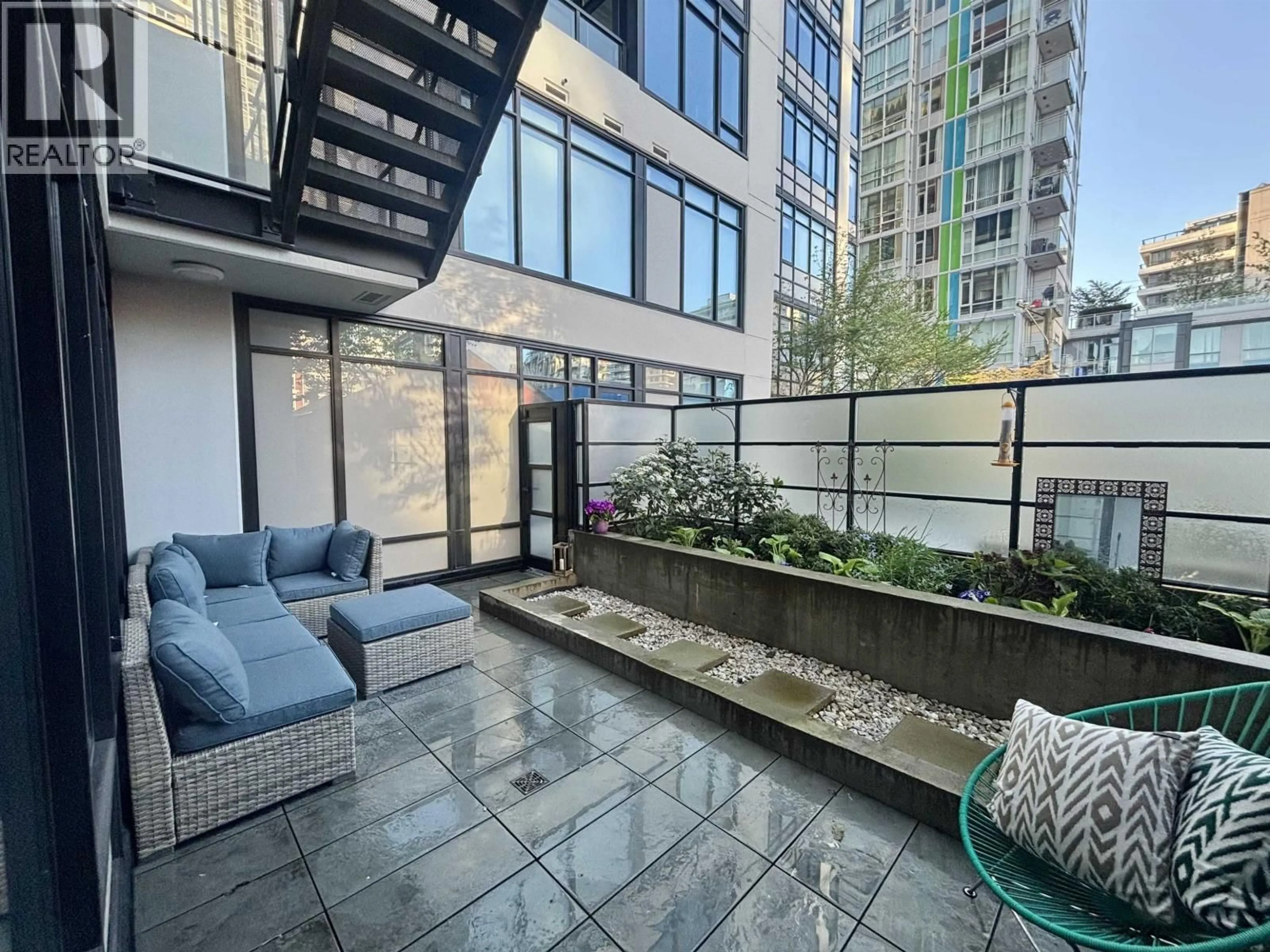 Patio, city buildings view from balcony for 201 - 1788 ONTARIO STREET, Vancouver British Columbia V5T0G3