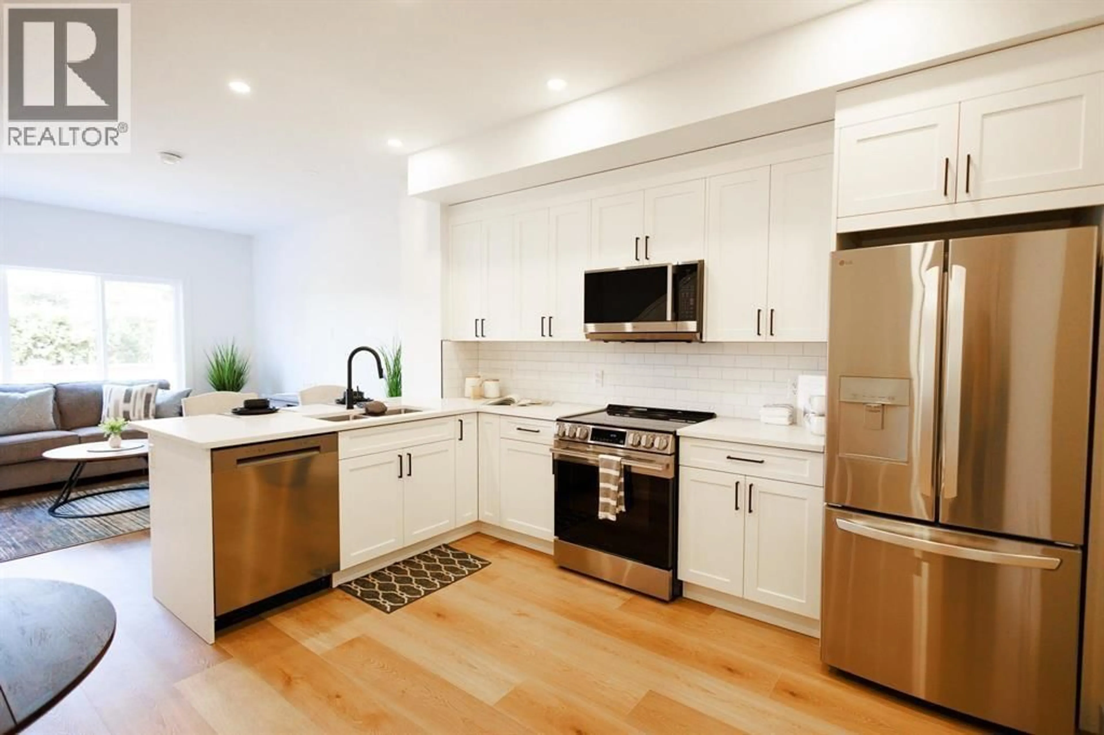 Open concept kitchen, wood/laminate floor for 5 - 3302 EBY STREET, Terrace British Columbia V8G4B5
