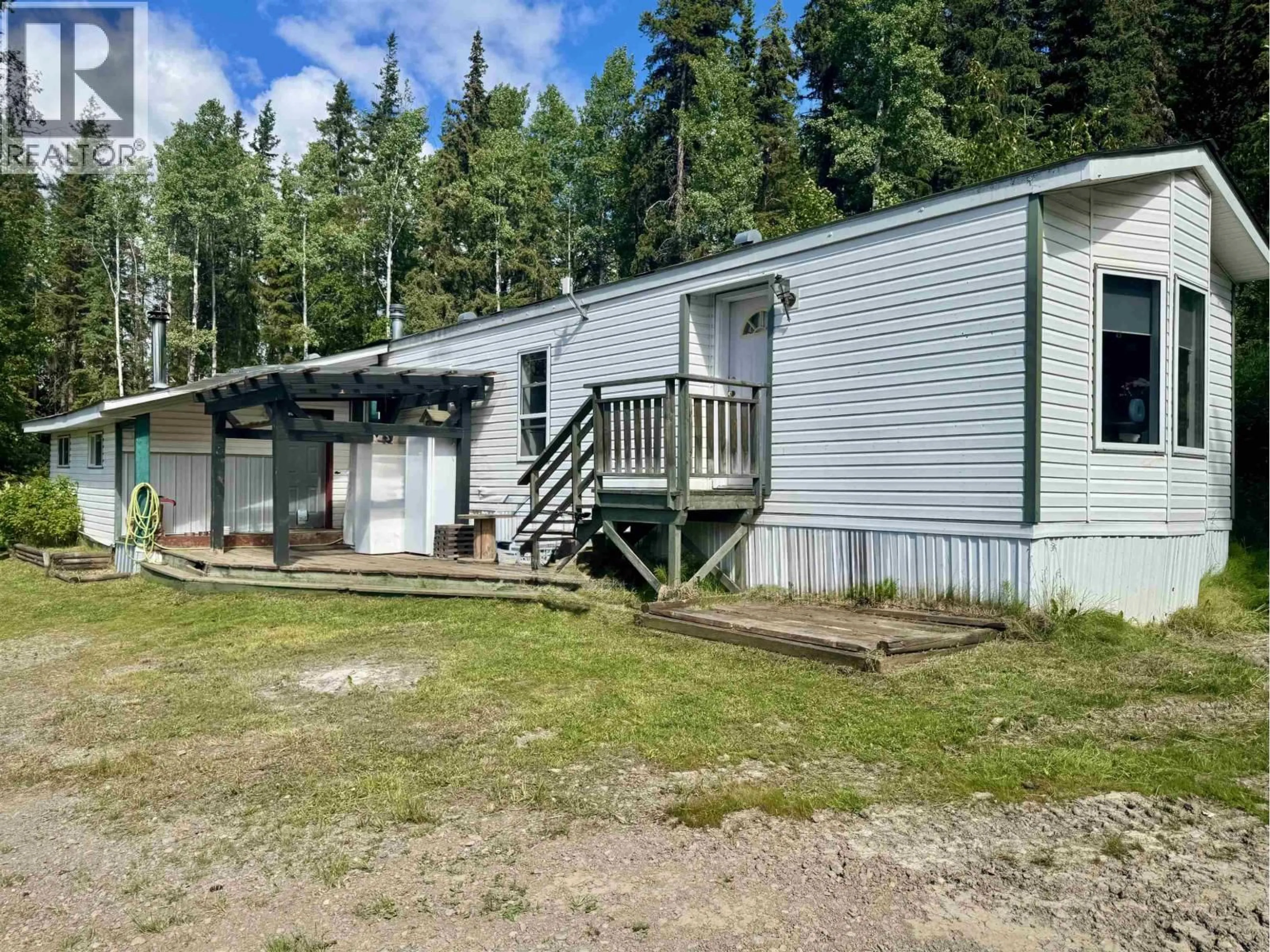 A pic from outside/outdoor area/front of a property/back of a property/a pic from drone, unknown for 1220 LOWLAND ROAD, Smithers British Columbia V0J2N6