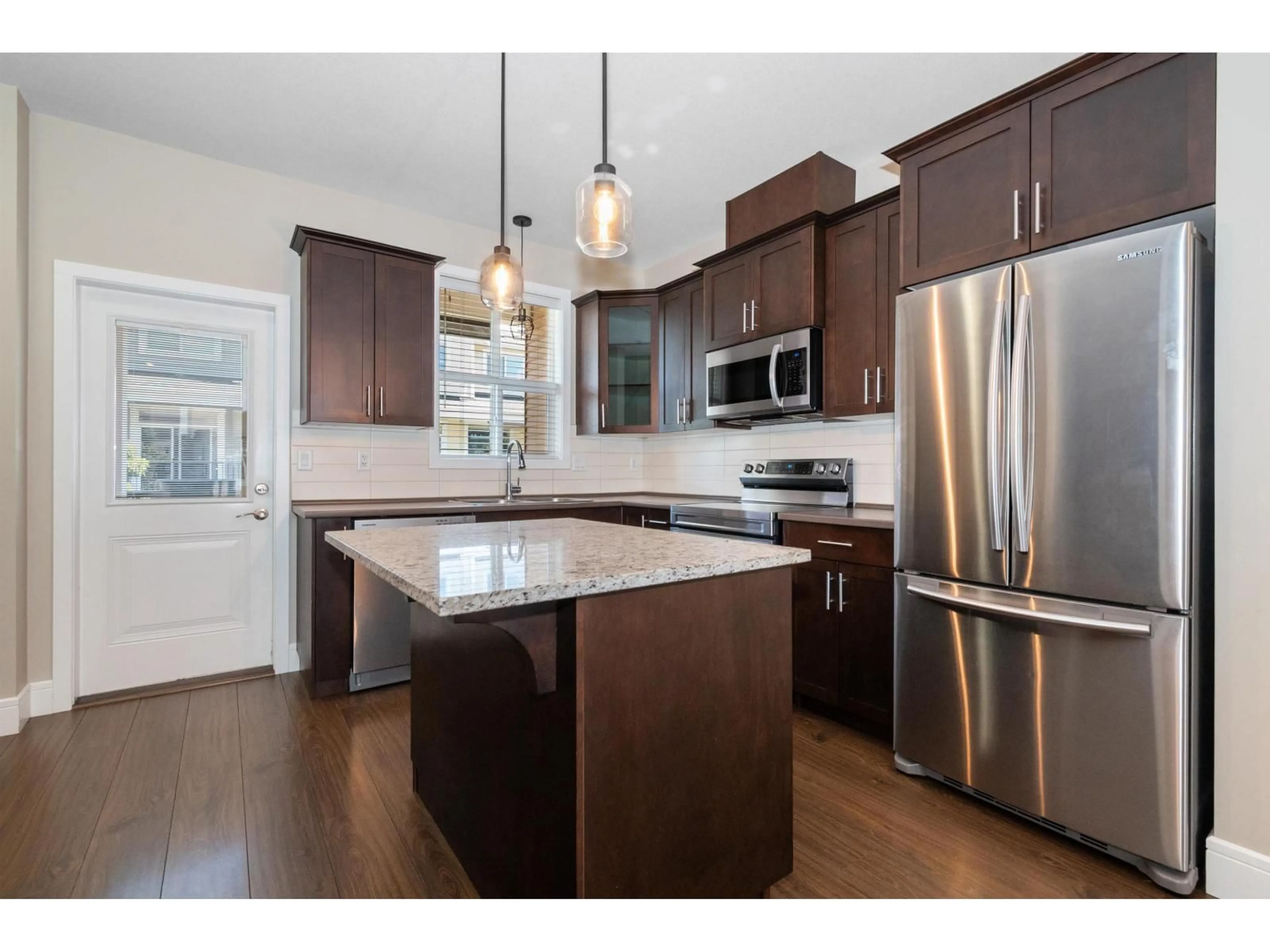 Open concept kitchen, wood/laminate floor for 2 - 44420 SHERRY DRIVE, Chilliwack British Columbia V2R0R6