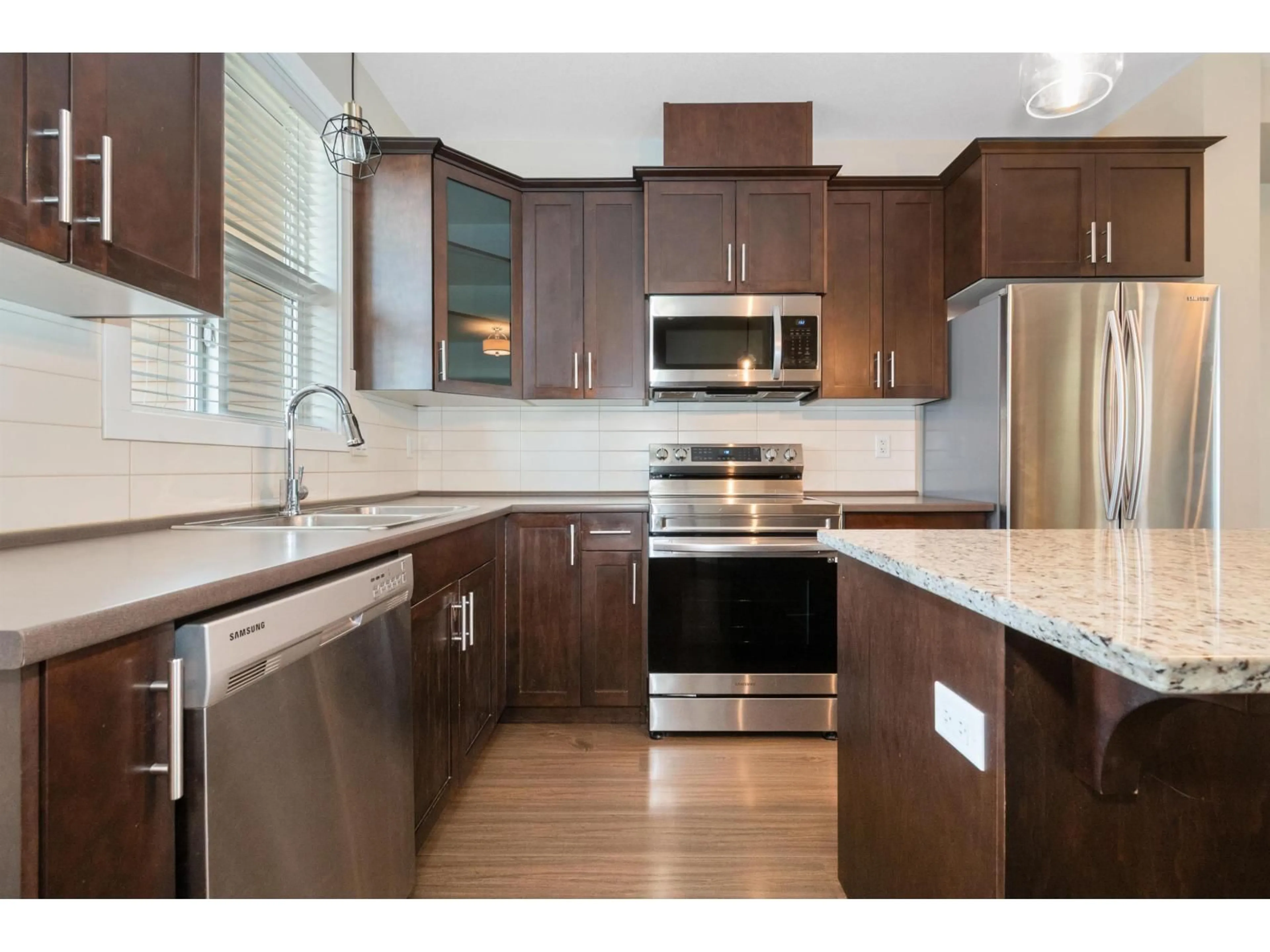 Open concept kitchen, wood/laminate floor for 2 - 44420 SHERRY DRIVE, Chilliwack British Columbia V2R0R6