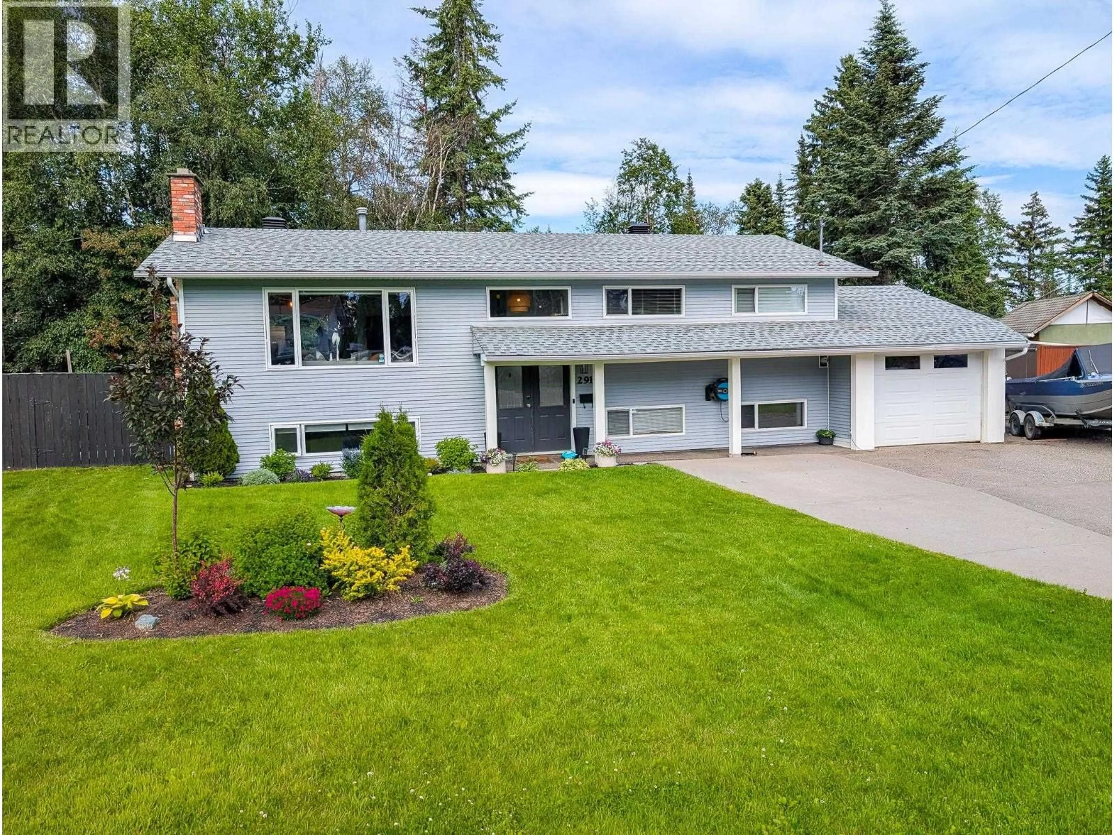 Home with vinyl exterior material, street for 2910 WILDWOOD CRESCENT, Prince George British Columbia V2K3J3