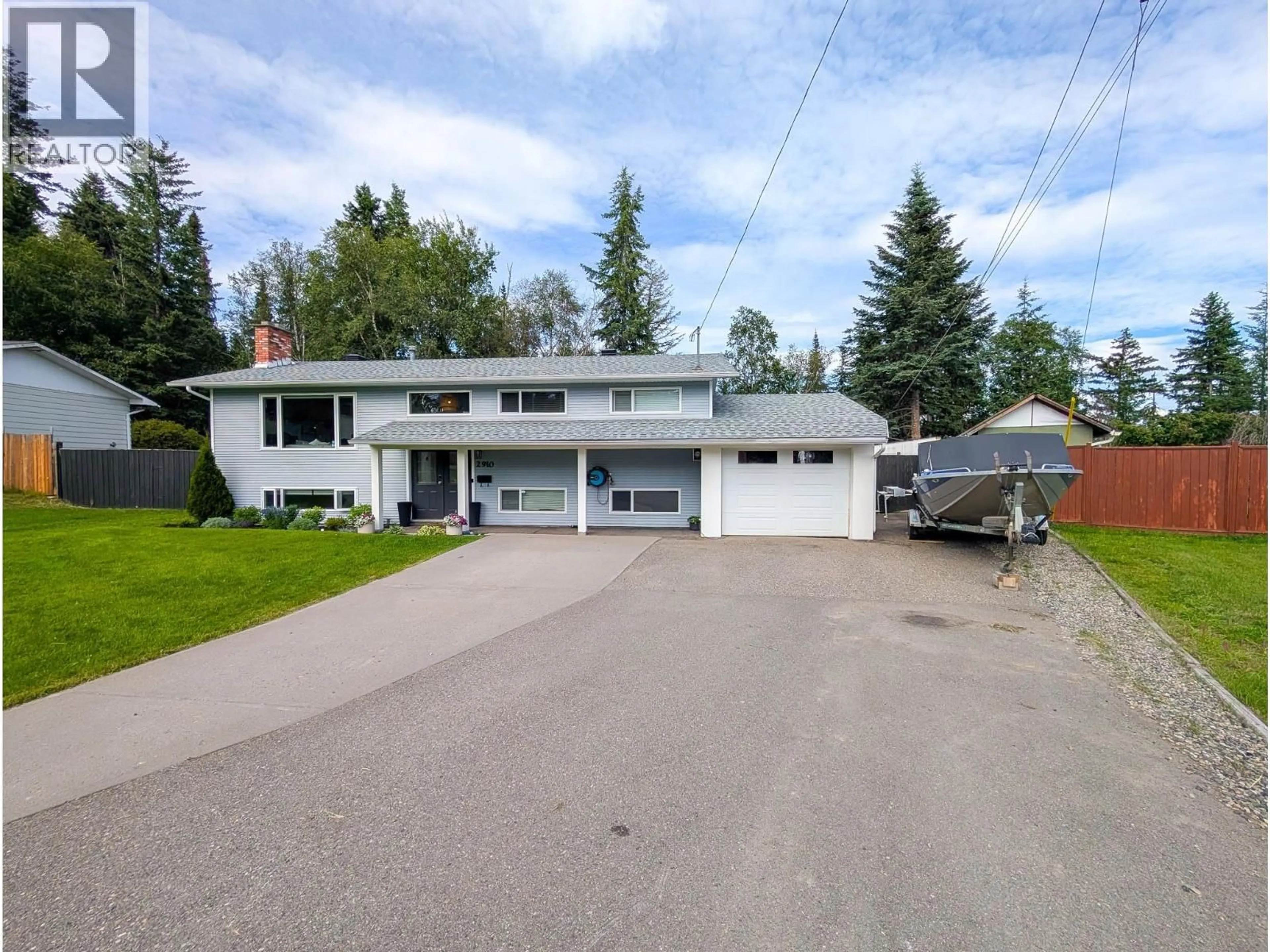 A pic from outside/outdoor area/front of a property/back of a property/a pic from drone, street for 2910 WILDWOOD CRESCENT, Prince George British Columbia V2K3J3