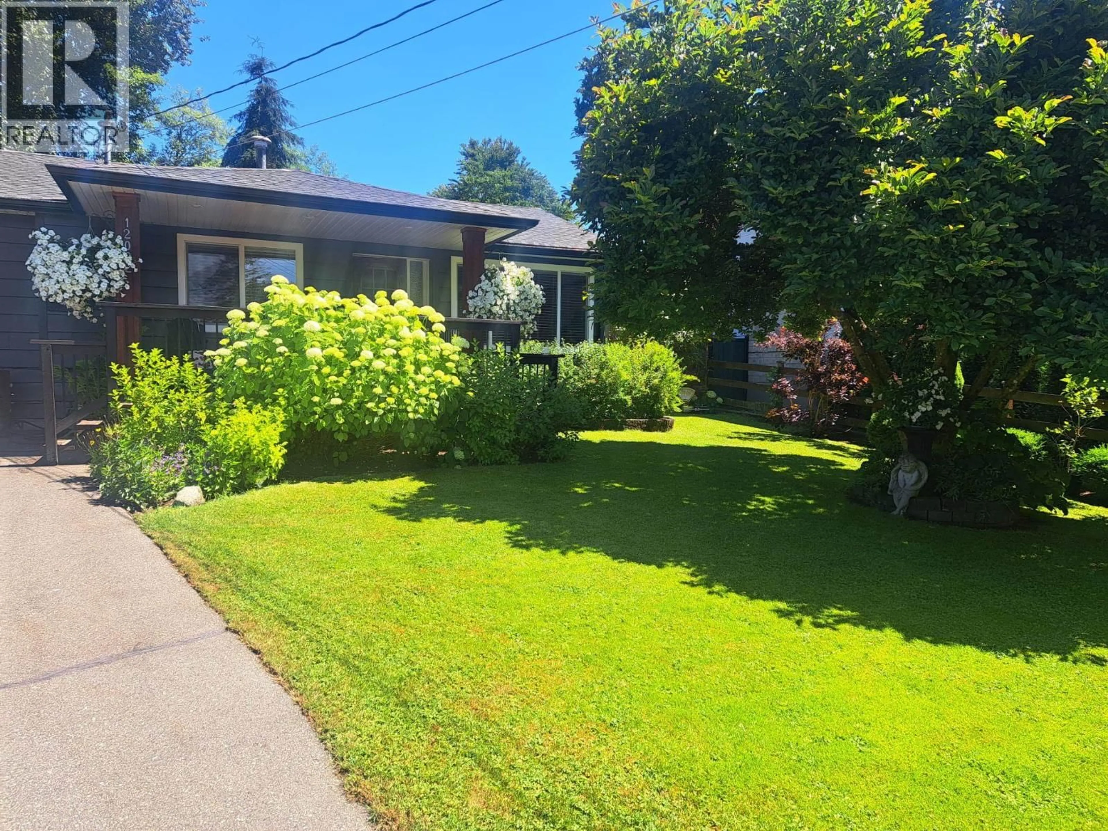 A pic from outside/outdoor area/front of a property/back of a property/a pic from drone, street for 12082 261 STREET, Maple Ridge British Columbia V2W2A6