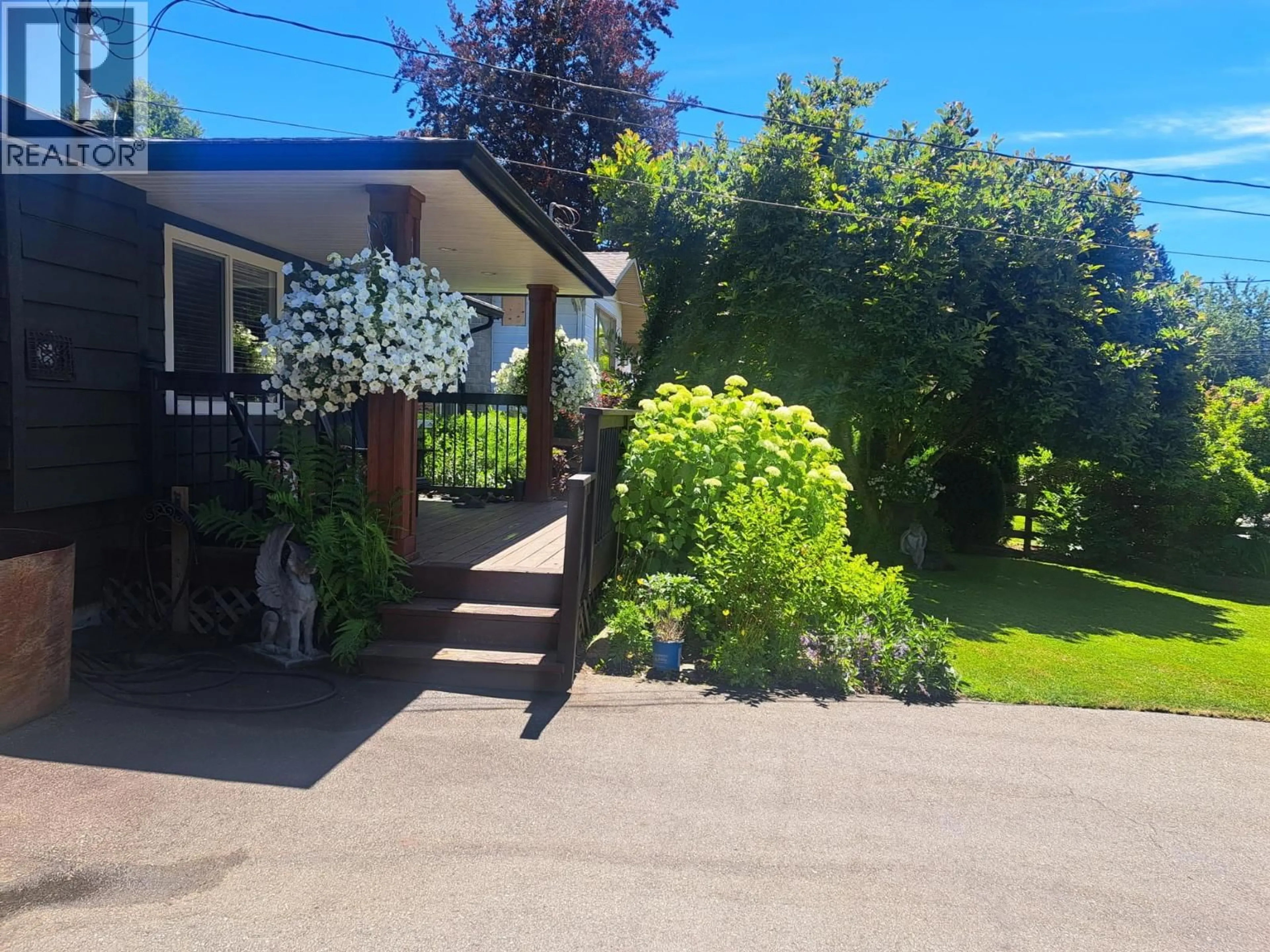 A pic from outside/outdoor area/front of a property/back of a property/a pic from drone, street for 12082 261 STREET, Maple Ridge British Columbia V2W2A6