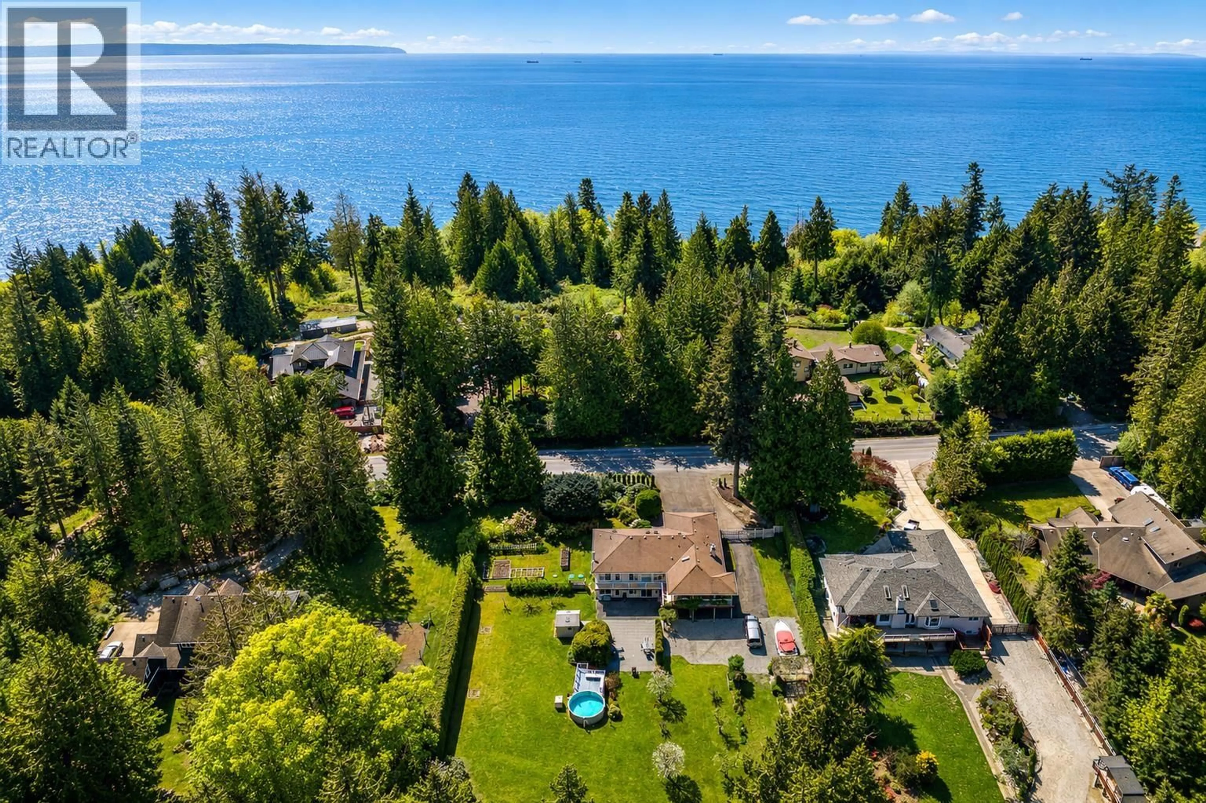 A pic from outside/outdoor area/front of a property/back of a property/a pic from drone, water/lake/river/ocean view for 7904 REDROOFFS ROAD, Halfmoon Bay British Columbia V7Z1A4