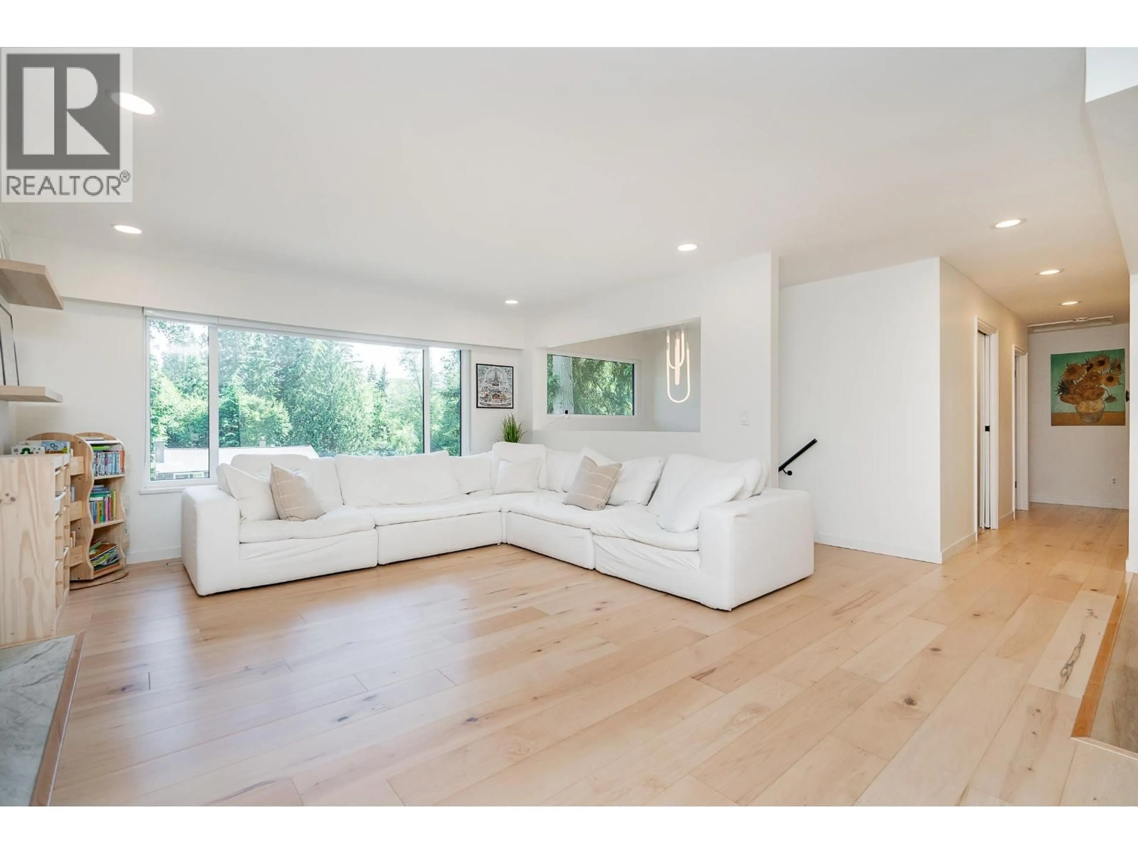 Living room with furniture, wood/laminate floor for 137 COLLEGE PARK WAY, Port Moody British Columbia V3H1S5