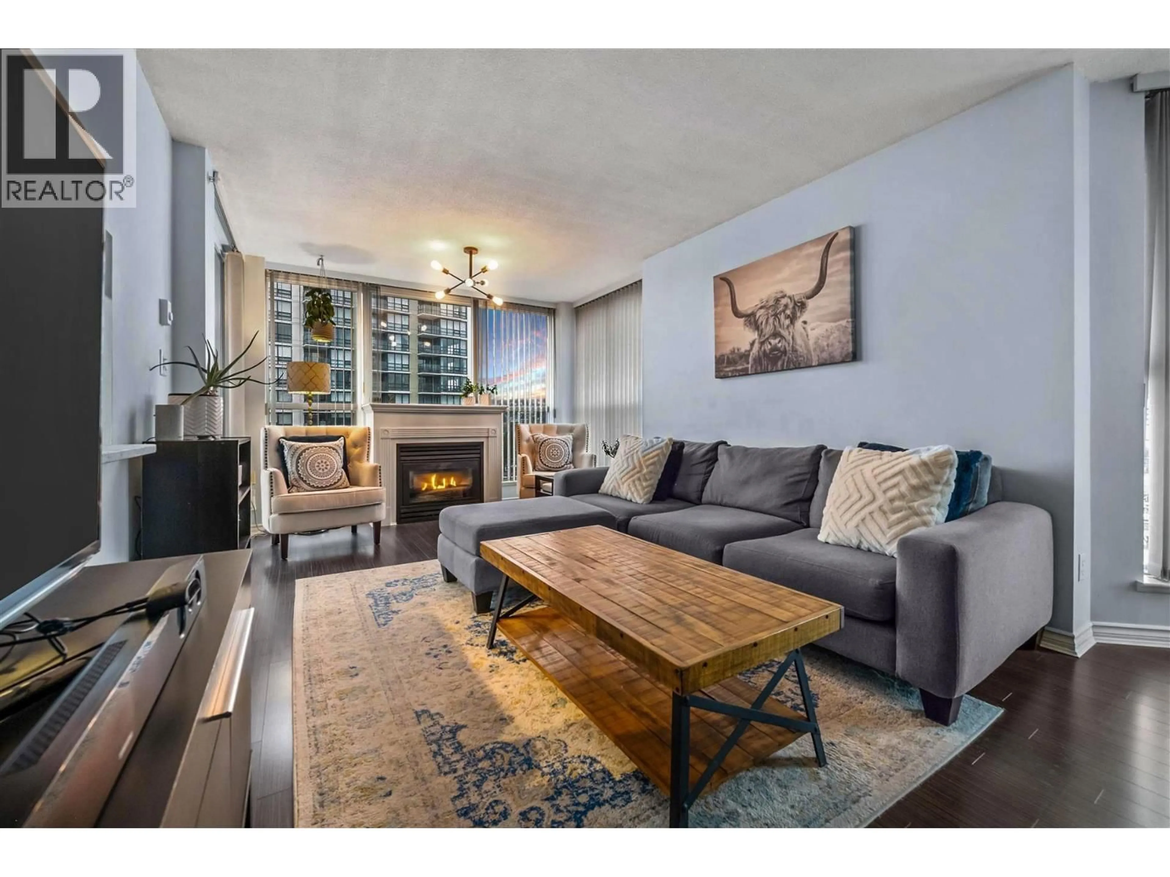 Living room with furniture, wood/laminate floor for 1006 - 10 LAGUNA COURT, New Westminster British Columbia V3M6W3