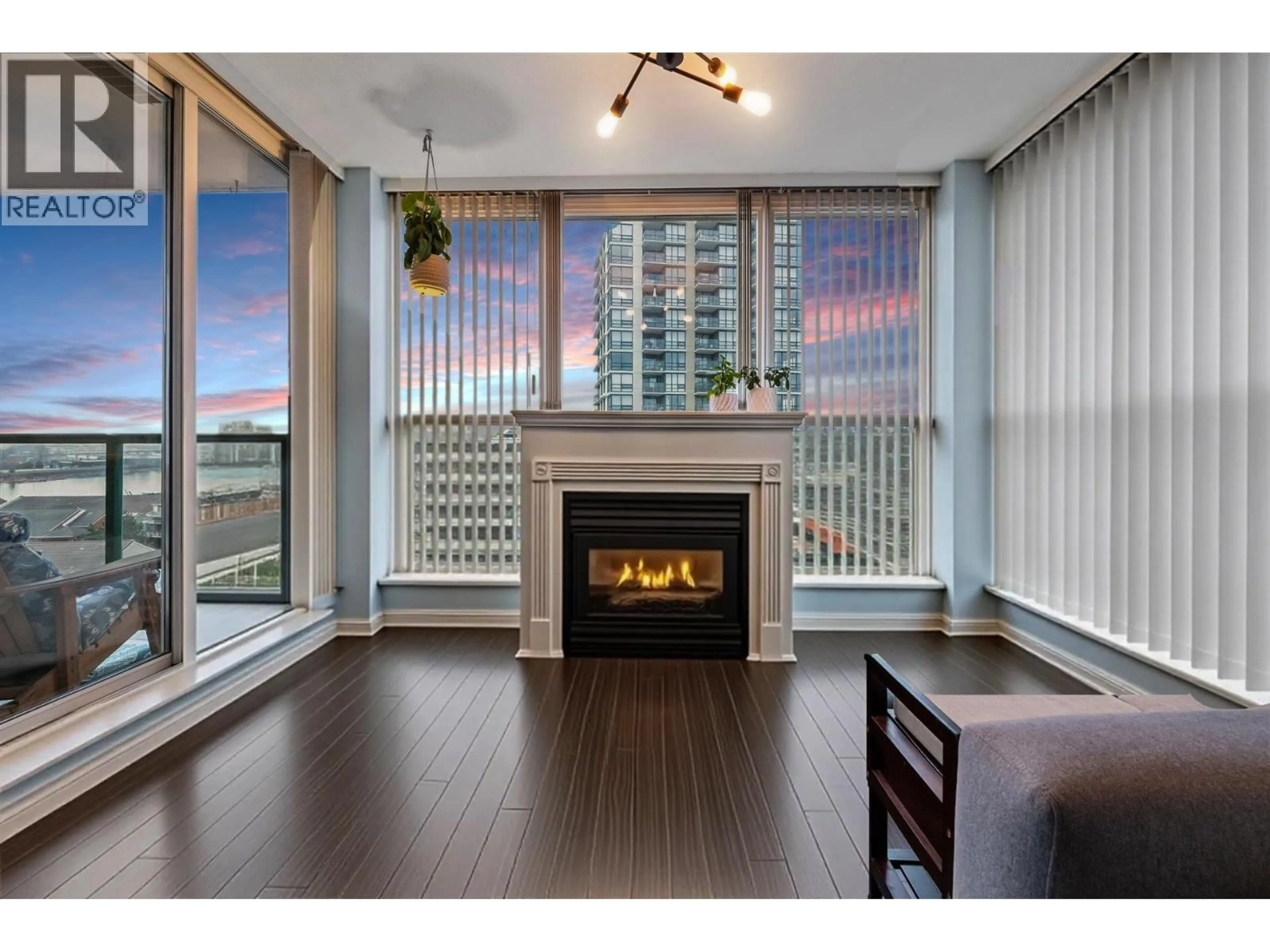 Living room with furniture, wood/laminate floor for 1006 - 10 LAGUNA COURT, New Westminster British Columbia V3M6W3