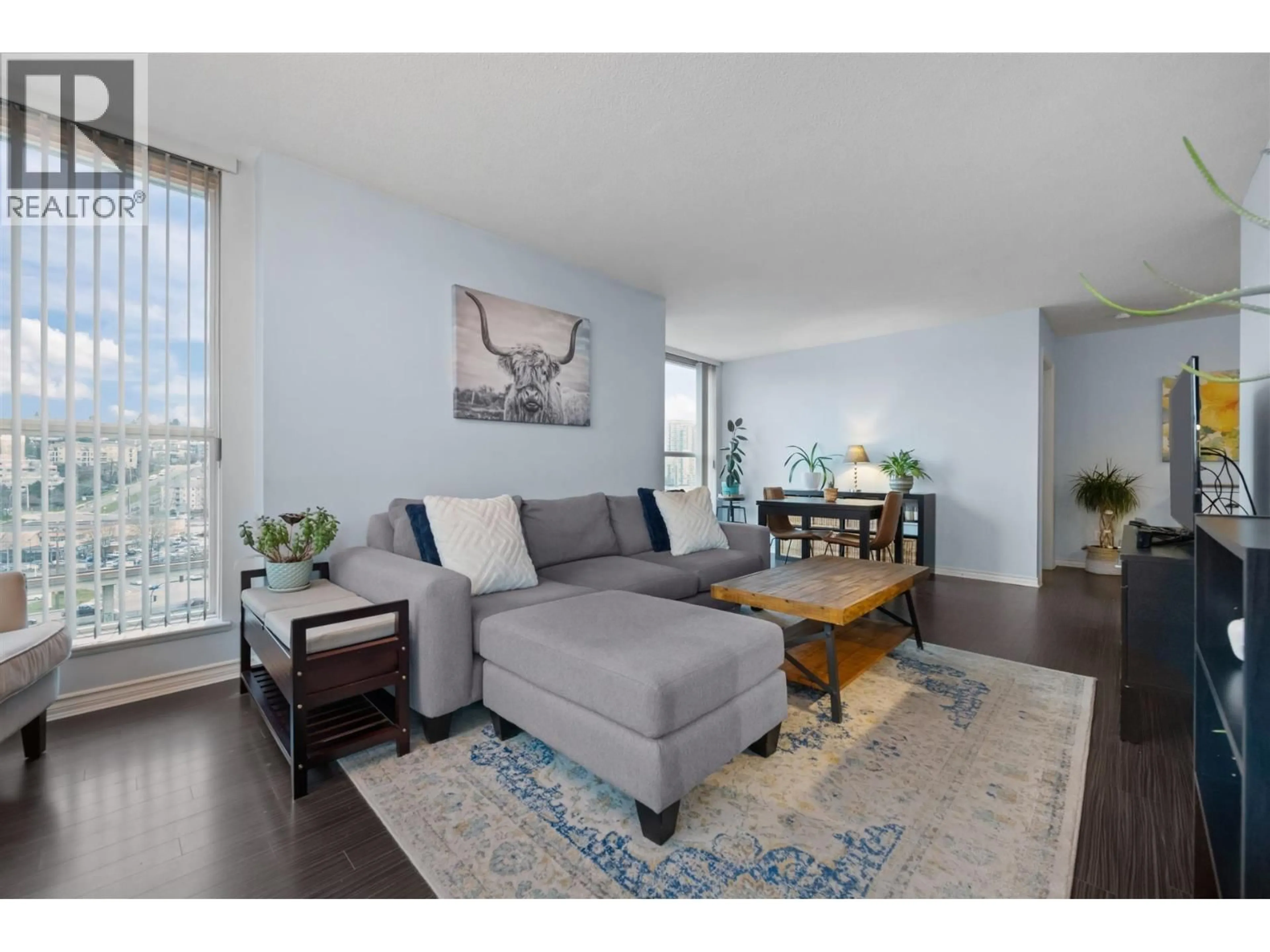 Living room with furniture, wood/laminate floor for 1006 - 10 LAGUNA COURT, New Westminster British Columbia V3M6W3