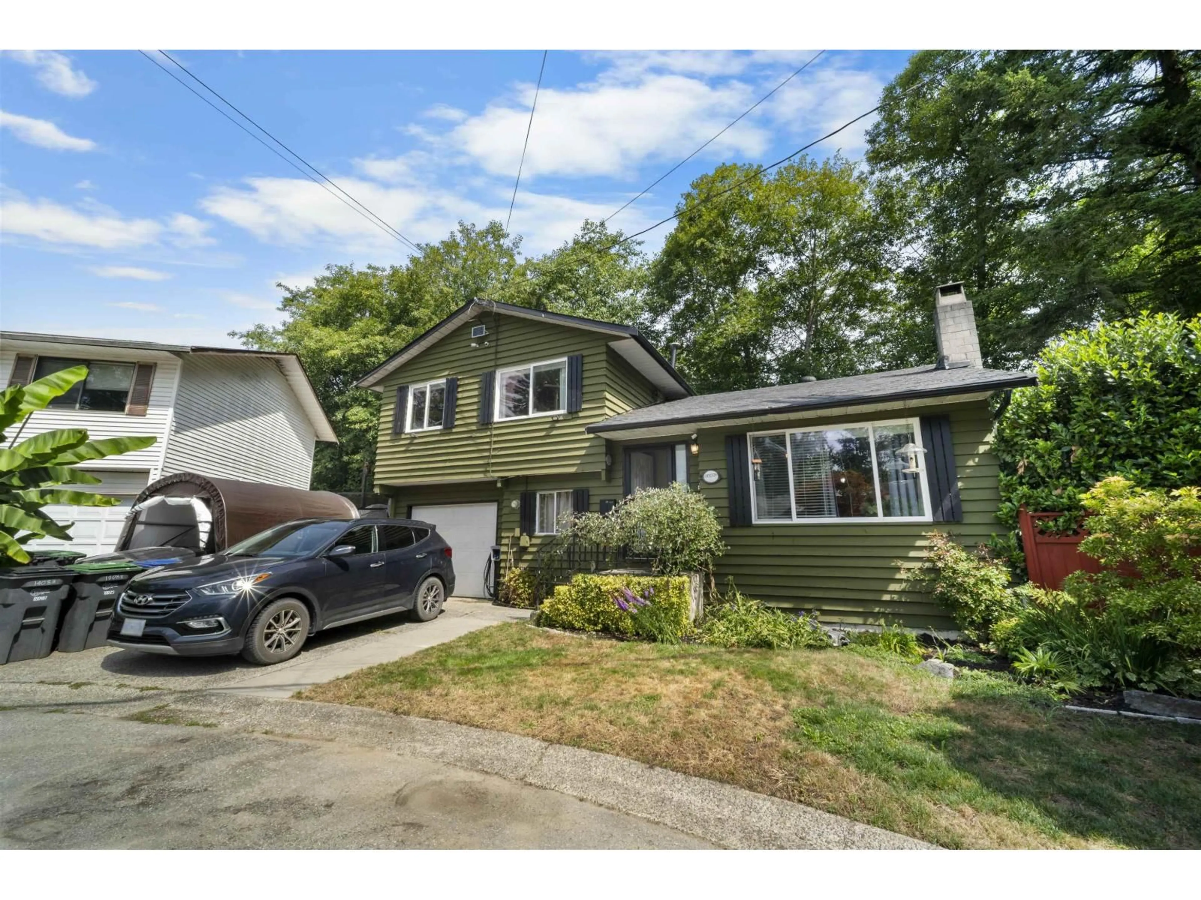 Home with vinyl exterior material, street for 14083 66 AVENUE, Surrey British Columbia V3W2B2