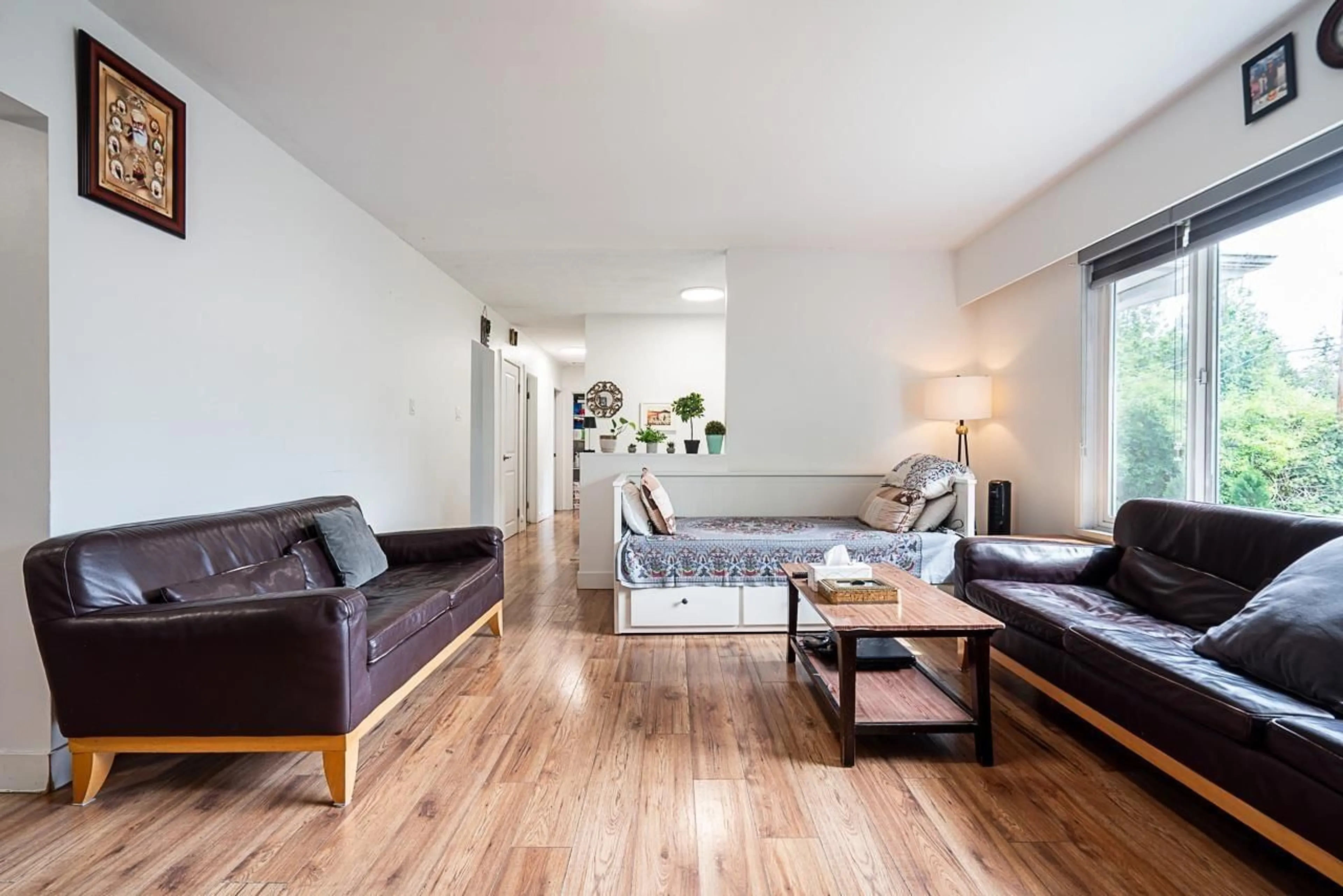 Living room with furniture, wood/laminate floor for 6837 144 STREET, Surrey British Columbia V3W5R9