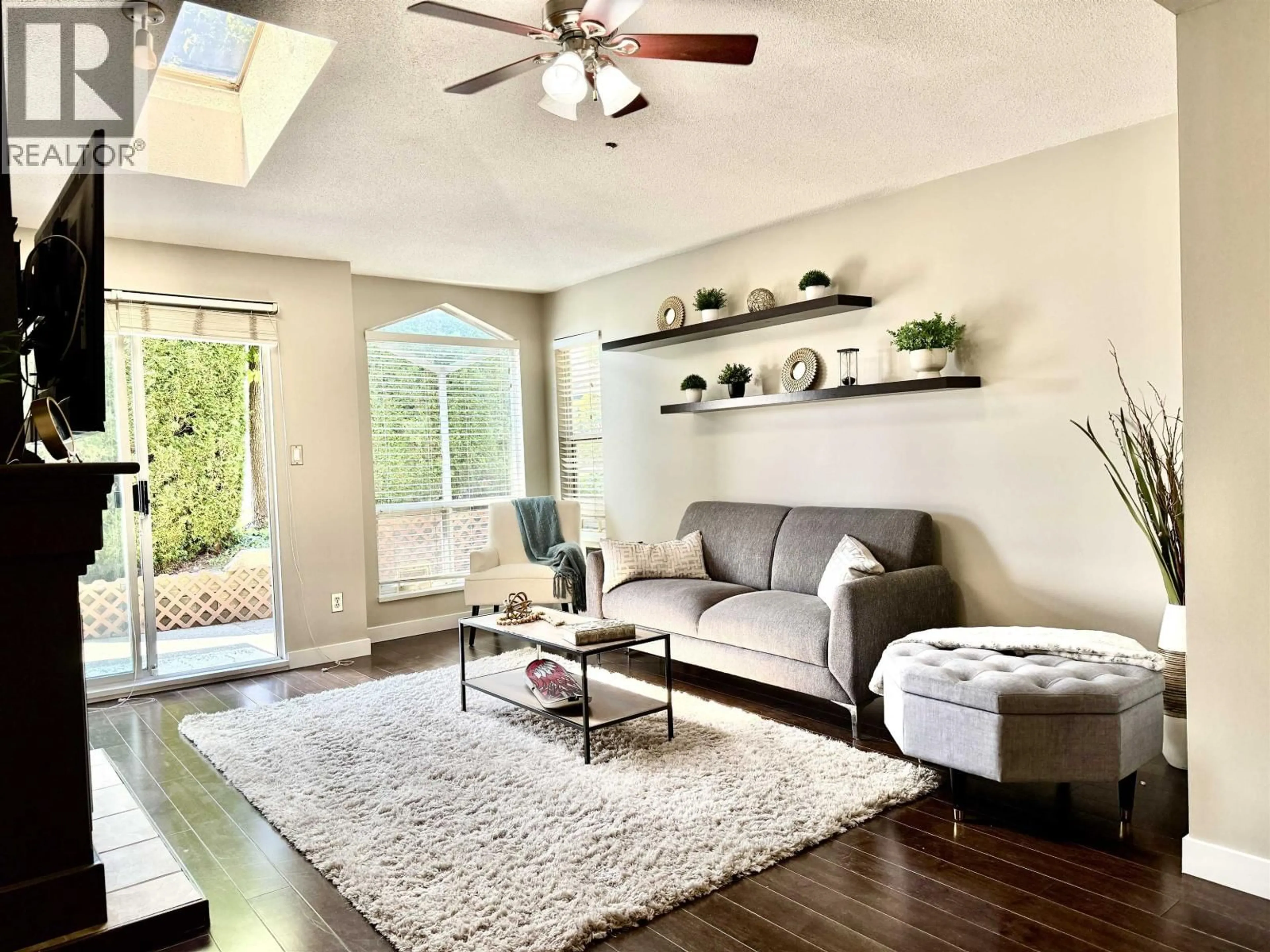 Living room with furniture, wood/laminate floor for 1124 ORR DRIVE, Port Coquitlam British Columbia V3C6H2