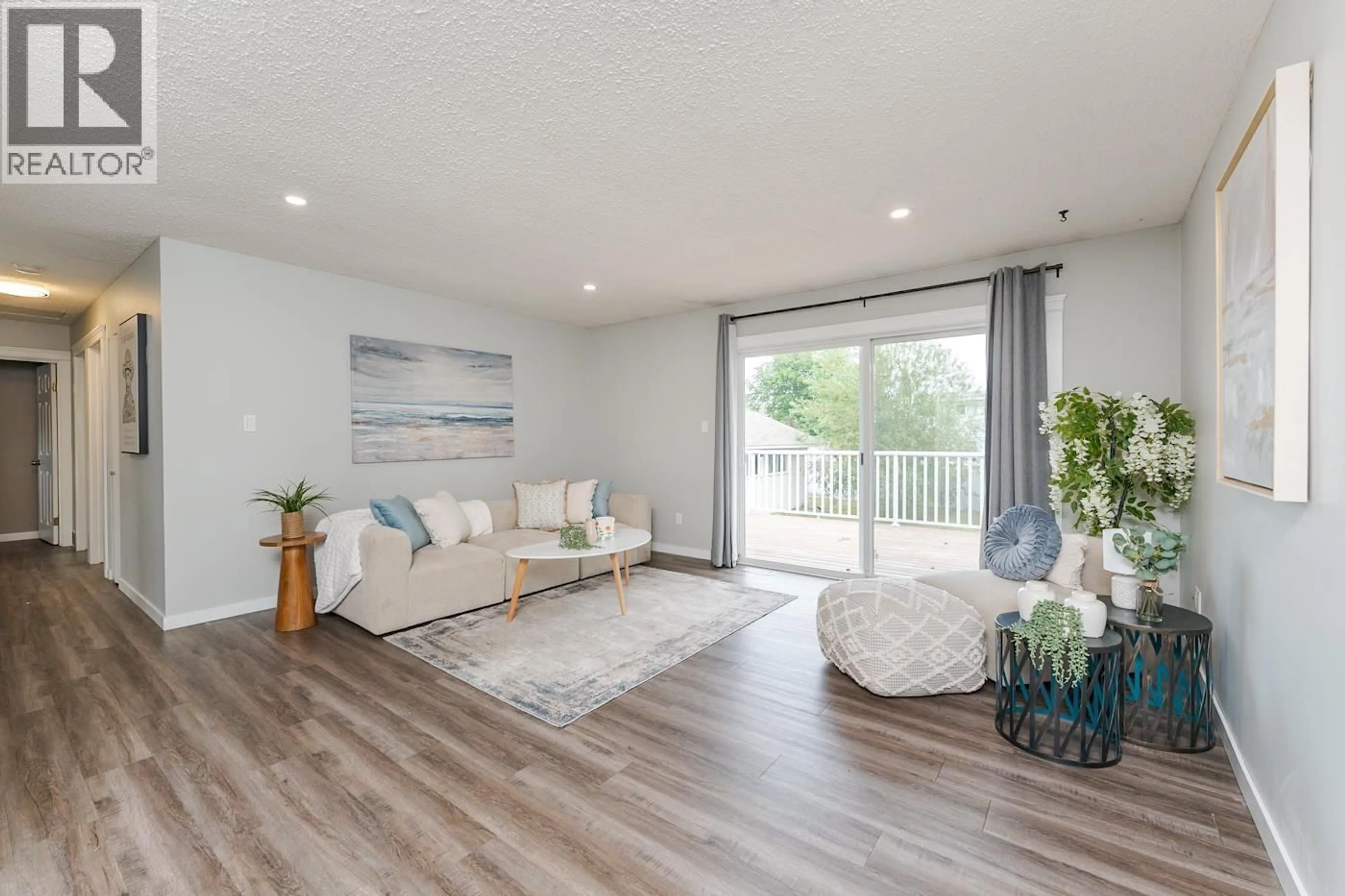 Living room with furniture, wood/laminate floor for 636 LACOMA STREET, Prince George British Columbia V2M5B9