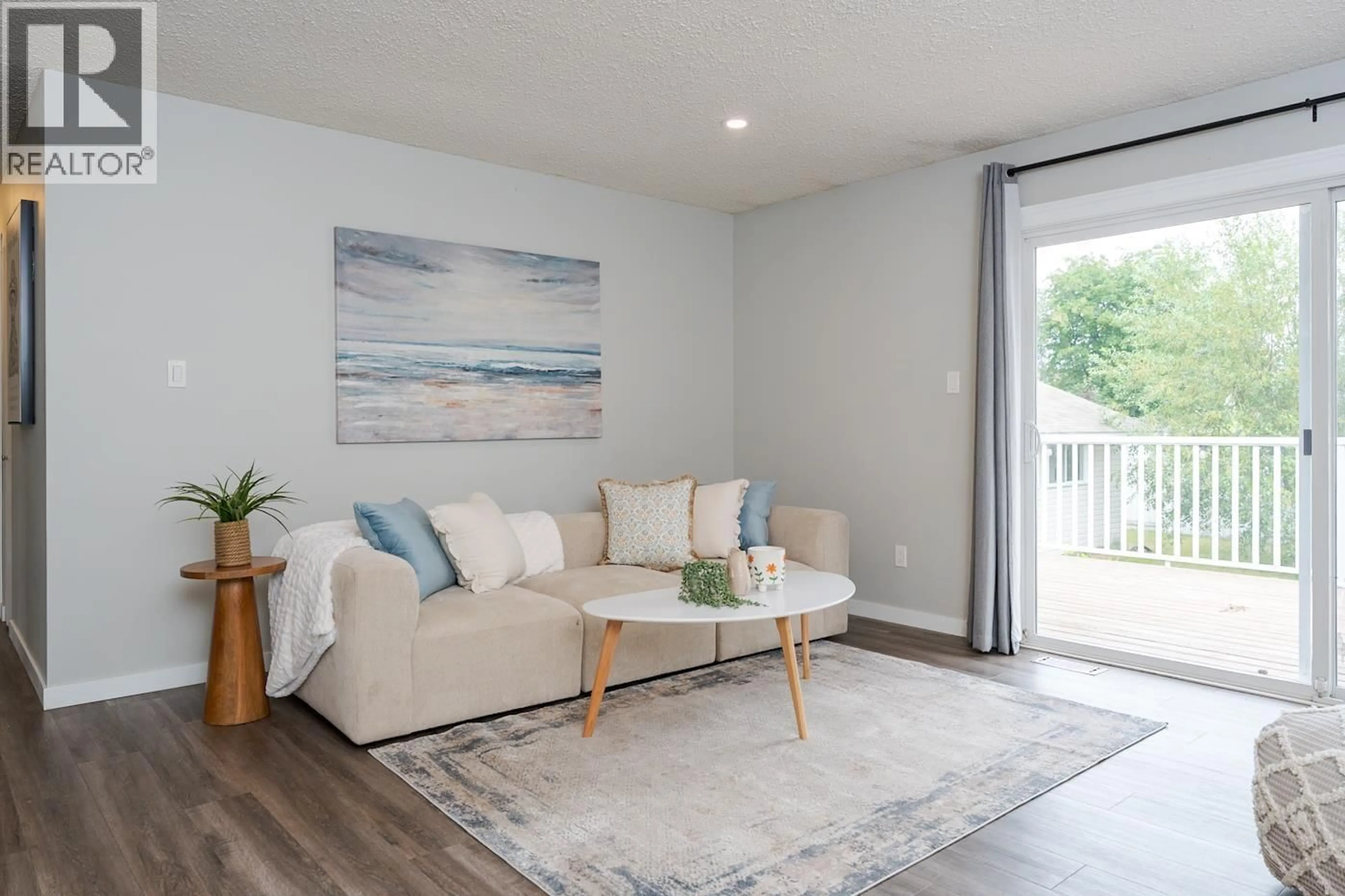 Living room with furniture, wood/laminate floor for 636 LACOMA STREET, Prince George British Columbia V2M5B9