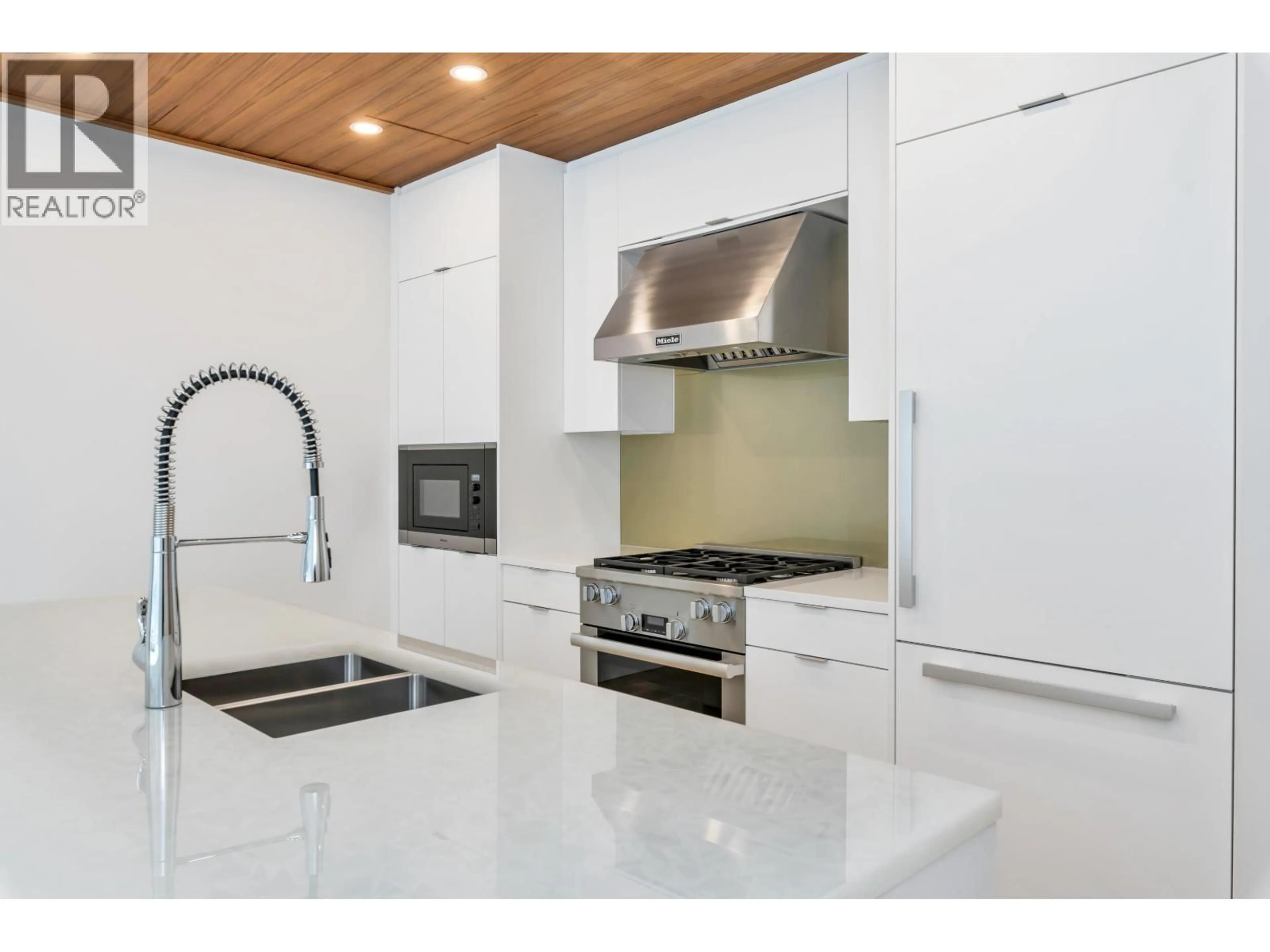 Contemporary kitchen, unknown for 305 - 6707 NELSON AVENUE, West Vancouver British Columbia V7W2B2