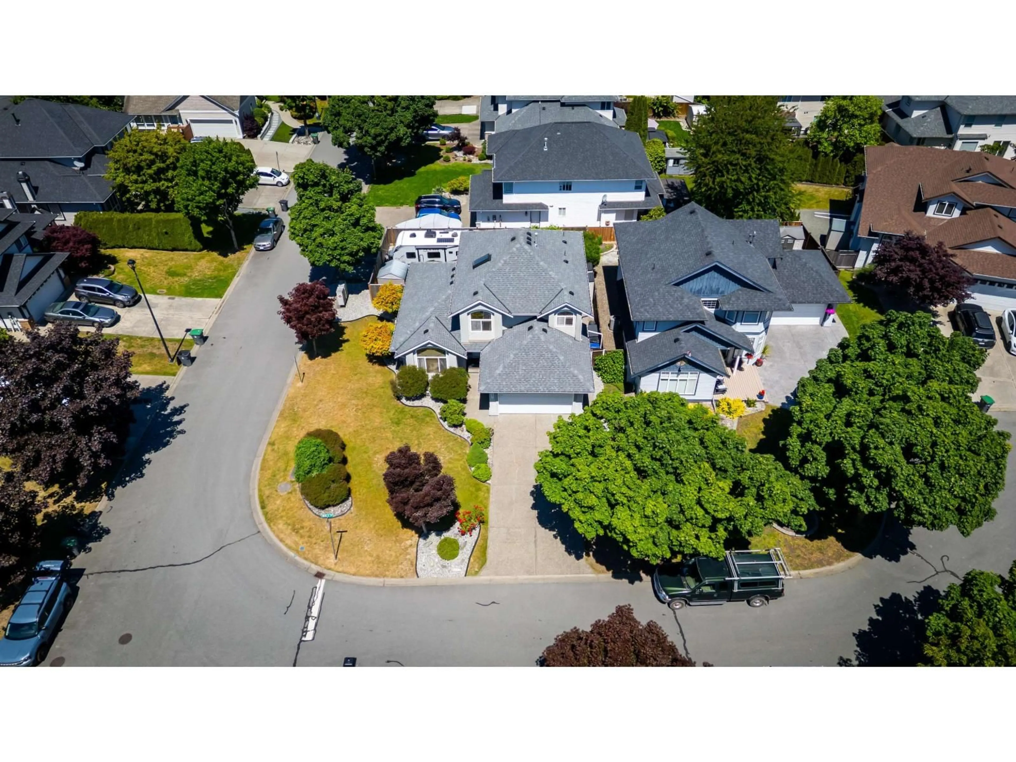 A pic from outside/outdoor area/front of a property/back of a property/a pic from drone, street for 18851 64A AVENUE, Surrey British Columbia V3S8V3
