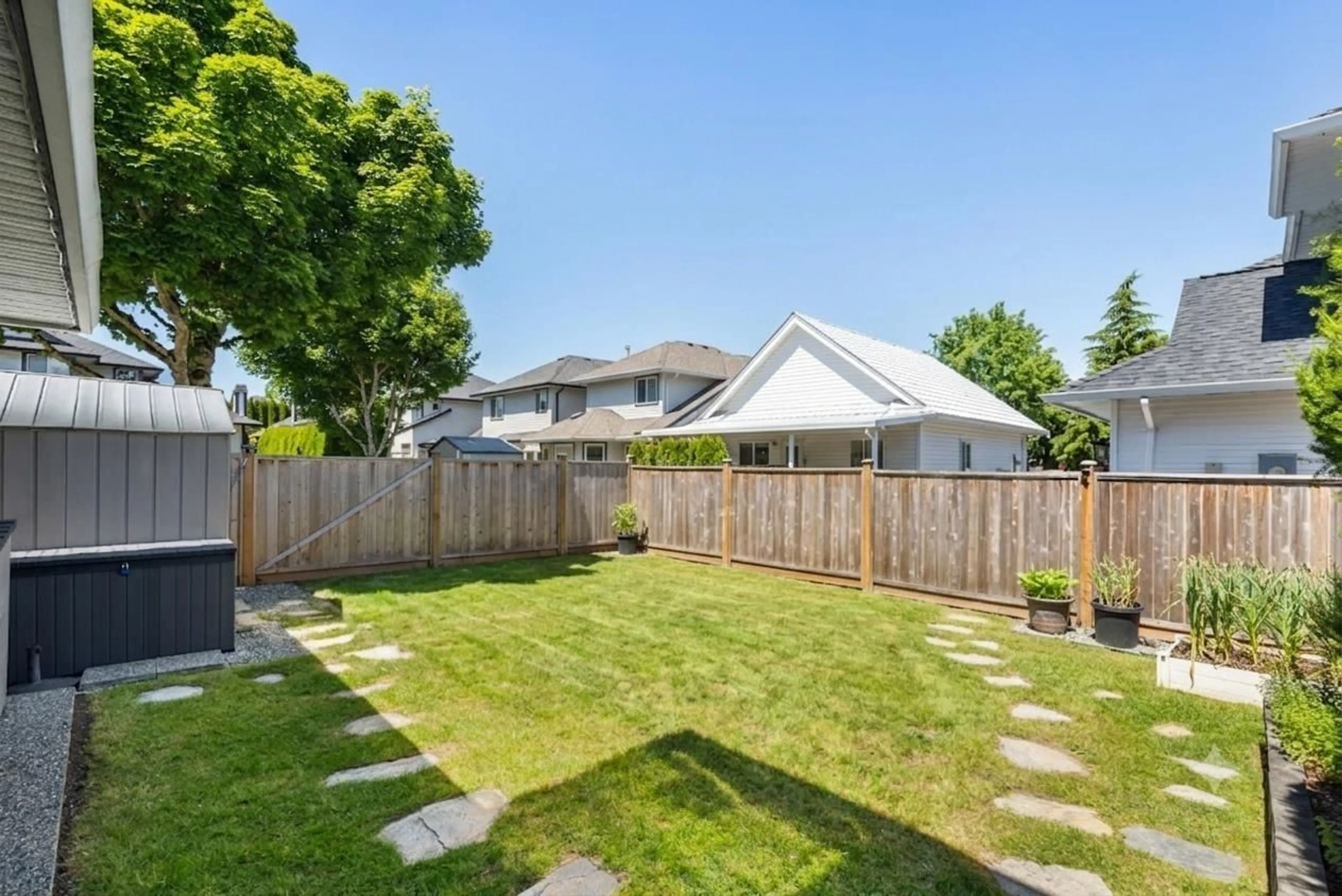 A pic from outside/outdoor area/front of a property/back of a property/a pic from drone, street for 18851 64A AVENUE, Surrey British Columbia V3S8V3