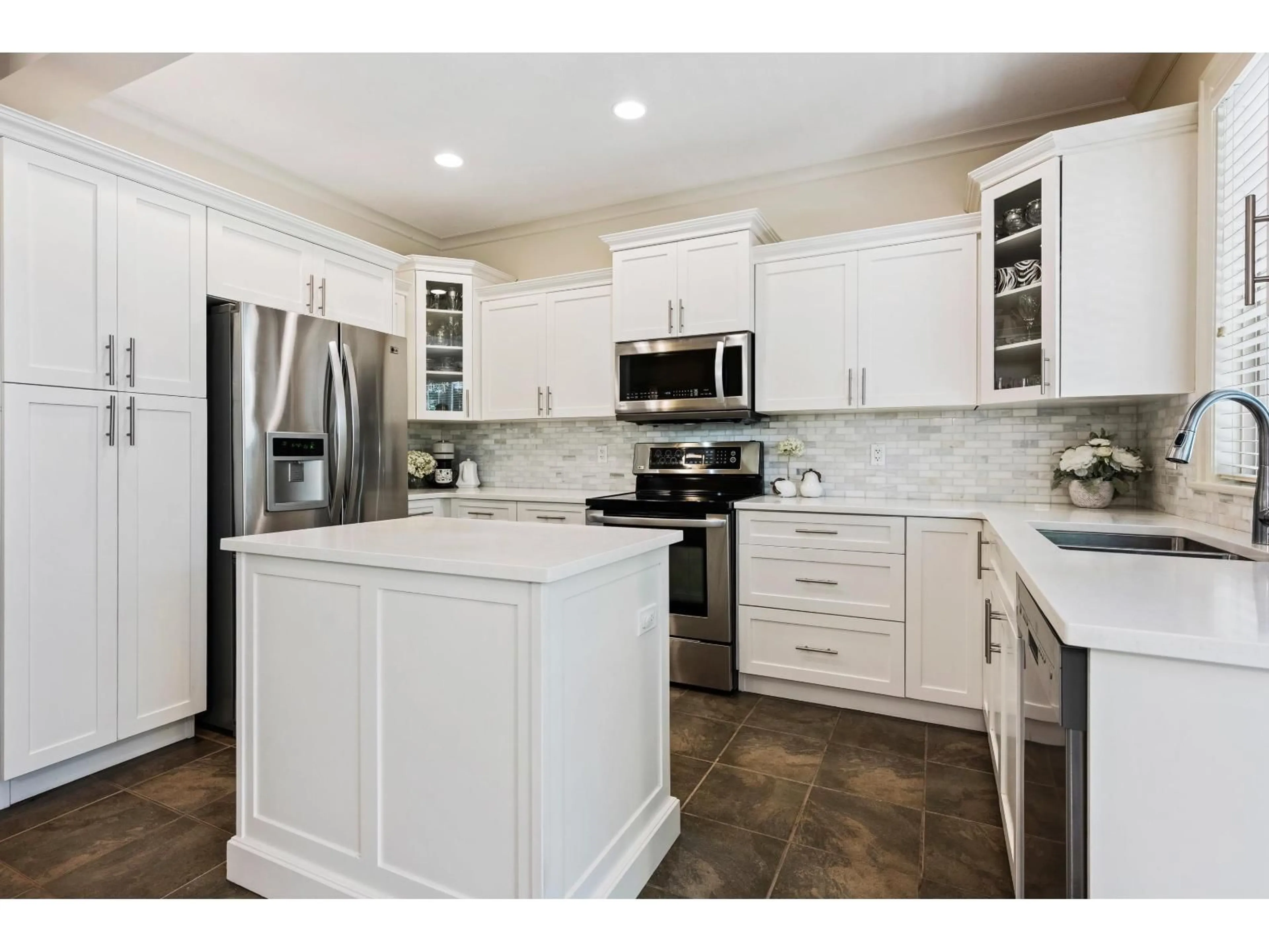 Open concept kitchen, ceramic/tile floor for 5975 MATSQUI STREET, Chilliwack British Columbia V2R0G6