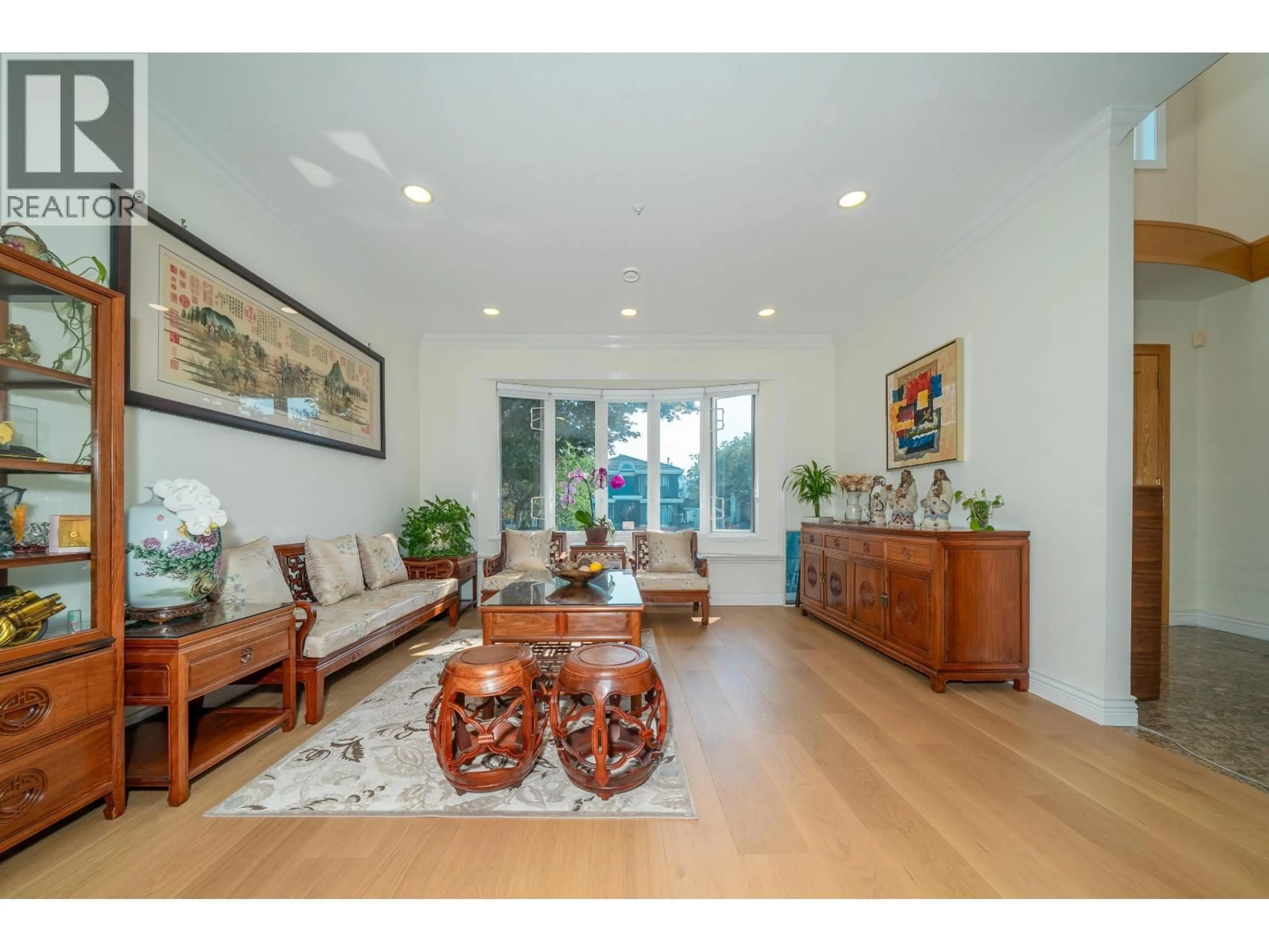 Living room with furniture, wood/laminate floor for 763 W 64TH AVENUE, Vancouver British Columbia V6P2L2